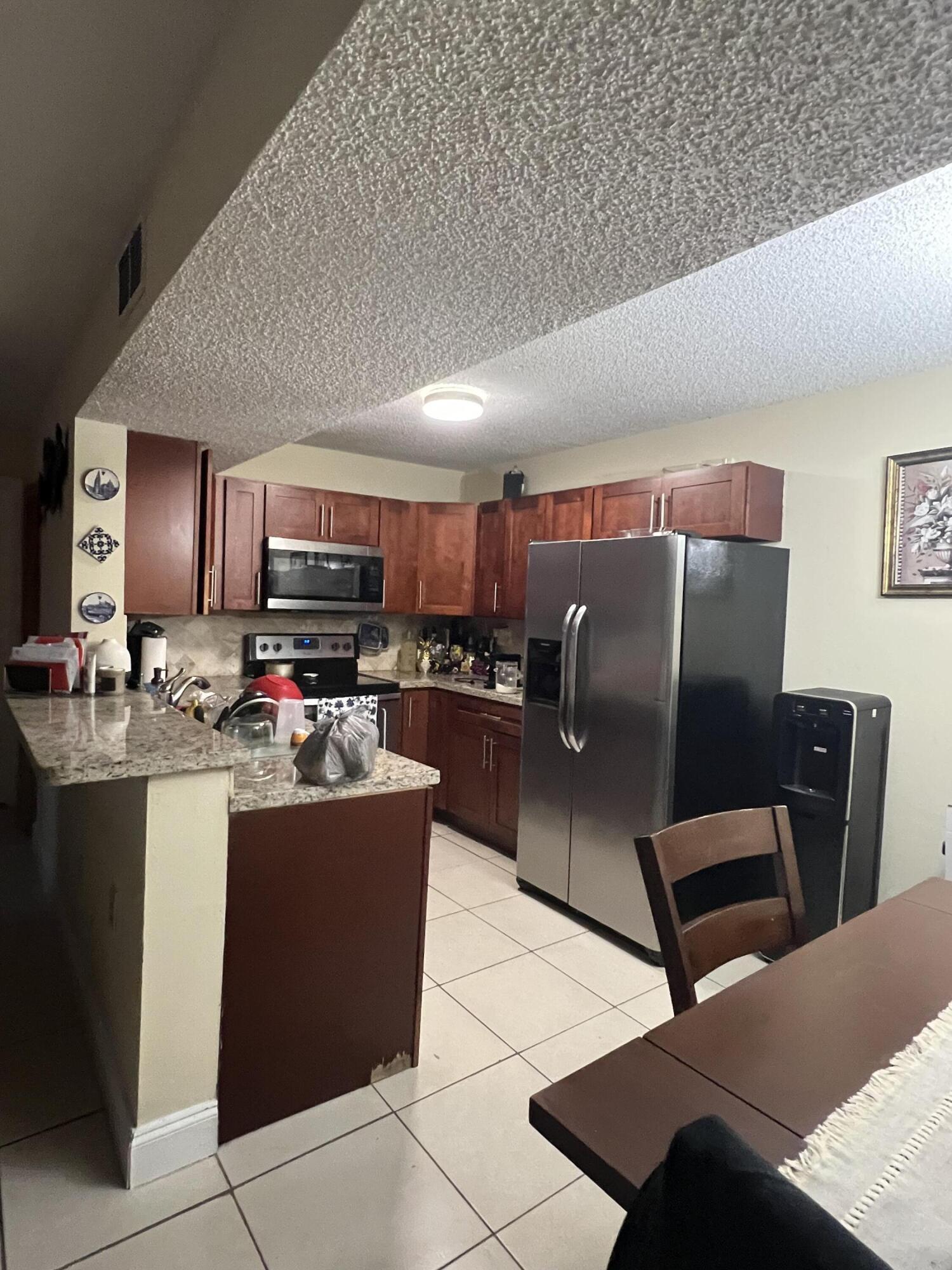 PALMS OF PEMBROKE CONDO - Residential Lease