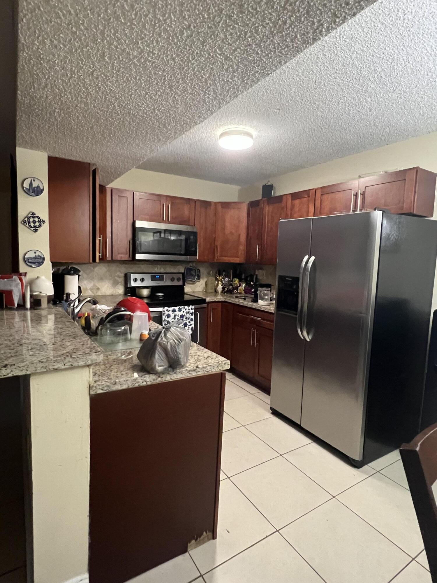 PALMS OF PEMBROKE CONDO - Residential Lease