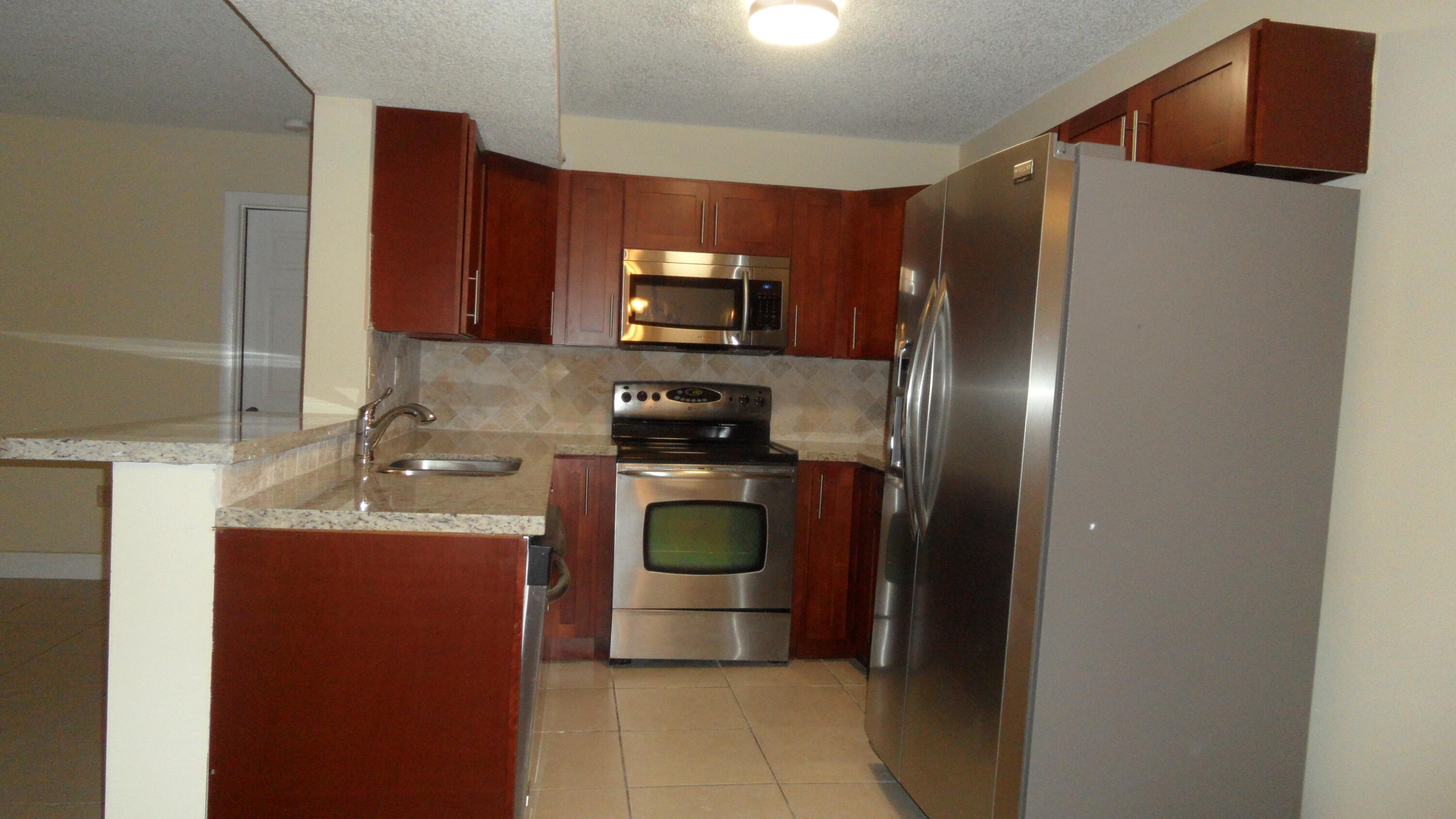 PALMS OF PEMBROKE CONDO - Residential Lease