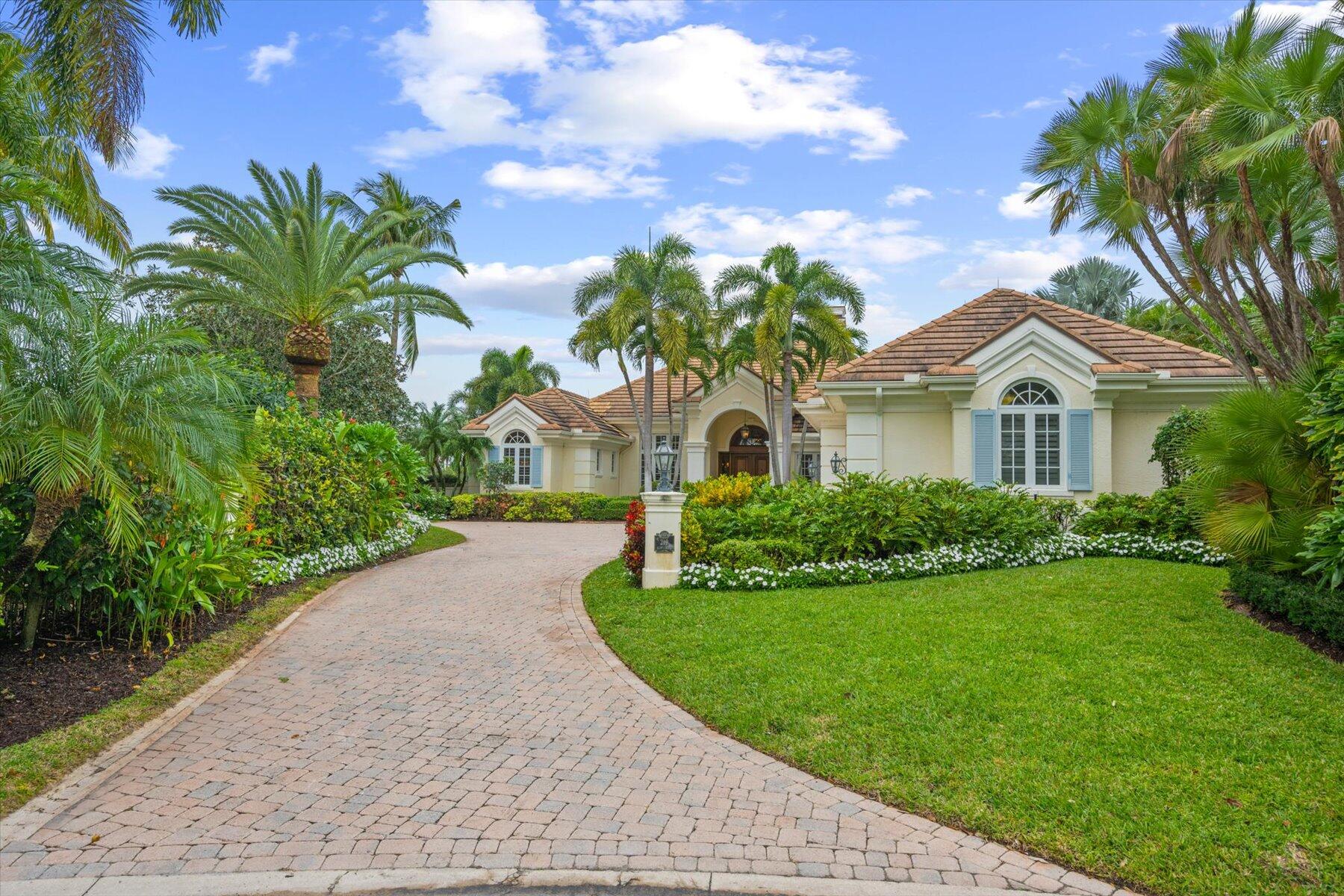 Welcome to luxury living at its finest in the prestigious Loxahatchee Club! This exquisite 5-bedroom, 5-and-a-half-bathroom estate boasts over 5,351 square feet of impeccably designed living space, situated on a coveted golf course lot.
Upon entering, you are greeted by soaring ceilings and elegant architectural details that define the home's timeless appeal. The spacious floor plan seamlessly blends both formal and casual living spaces, offering the perfect balance for everyday living and entertaining on any scale.
The heart of the home is the gourmet kitchen, featuring top-of-the-line appliances, custom cabinetry, and a large center island, all overlooking the scenic views of the golf course and tranquil lake beyond. Adjacent to the kitchen, the cozy family room provides an inviting space to gather with loved ones.
Retreat to the luxurious master suite, complete with a spa-like en suite bathroom, offering a serene oasis to unwind at the end of the day. Four additional bedrooms, each with their own en suite bathrooms, provide ample accommodations for family and guests.
Outside, the expansive patio area is perfect for al fresco dining or lounging by the sparkling pool while taking in the picturesque views of the lush landscaping and shimmering lake.
The Loxahatchee Club is renowned for its world-class amenities, including championship golf course, tennis courts, a state-of-the-art fitness center, and fine dining options, all within a private gated community.
Don't miss your opportunity to own this exceptional residence in one of Jupiter's most exclusive neighborhoods. Schedule your private showing today and experience luxury living at its finest!