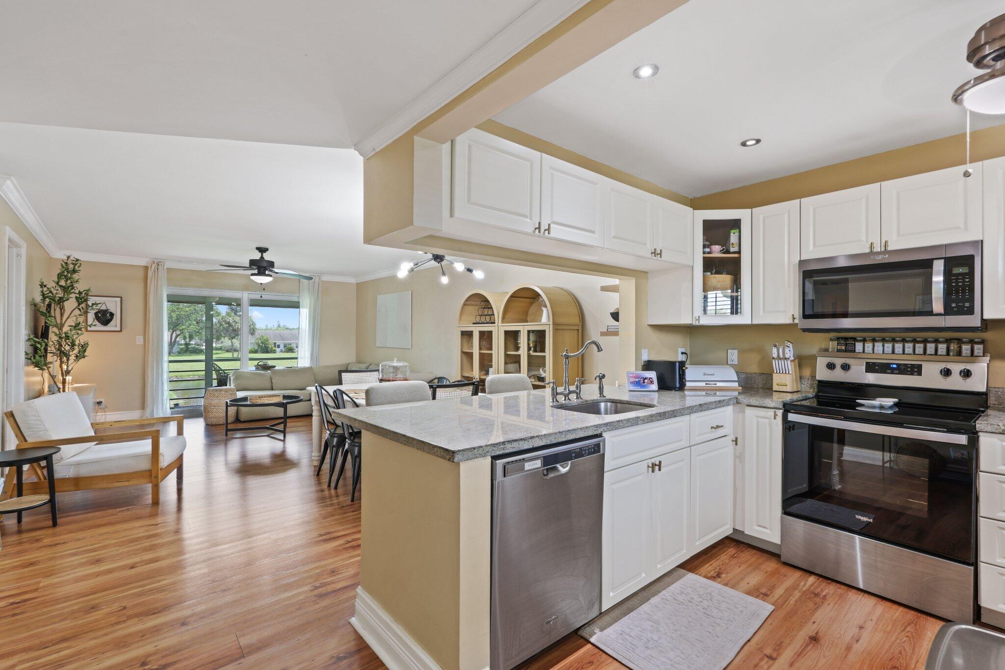 Welcome home to this bright and inviting waterfront condo in Lago Del Rey! This updated 2-bedroom, 2-bath residence offers comfortable living with beautiful lake views, hurricane-impact windows and doors, and a spacious open layout designed for easy living. The modern kitchen features granite countertops, stainless steel appliances, and plenty of cabinet space, while the generous living area flows seamlessly to the outdoors, creating the perfect setting to unwind after a long day. Lago Del Rey offers a variety of amenities, including a pool, fitness center, tennis courts, clubhouse, and scenic lakeside walking paths. Water is included in the rent, and the location is unbeatable—just minutes from shopping, restaurants, major highways, downtown Delray Beach, and the area's stunning beaches.