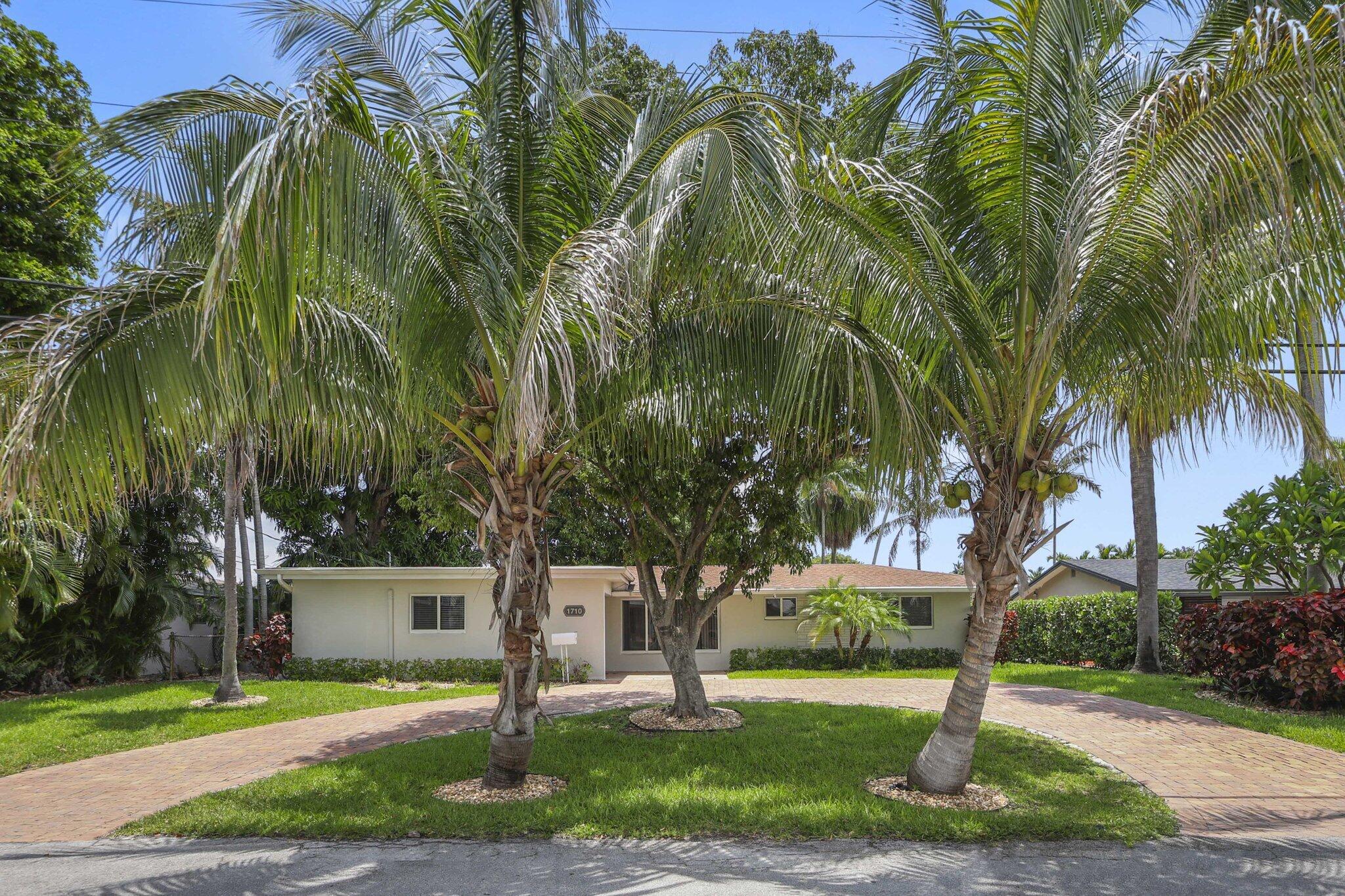 Waterfront Living in Pompano Beach — Updated 3/3 Pool Home with Ocean Access Annual rental on a canal with 65 feet of water frontage and ocean access — bring the boat. This updated 3 bedroom, 3 bathroom home offers the full South Florida waterfront lifestyle: a screened-in pool overlooking the canal, a fully fenced yard, and a covered front porch for your morning coffee. Inside, the home is unfurnished and move-in ready, giving you a clean slate with updated finishes throughout. Three full bathrooms mean no morning traffic jams, and the split layout works equally well for families, roommates, or work-from-home setups. Pets welcome with deposit. Available August 1st. $4,600/month. Homes with this combination of ocean access, pool, and fenced yard rarely come up for annual lease  tenant occupied until 7/31 - Available 8/1 - 12 month lease only