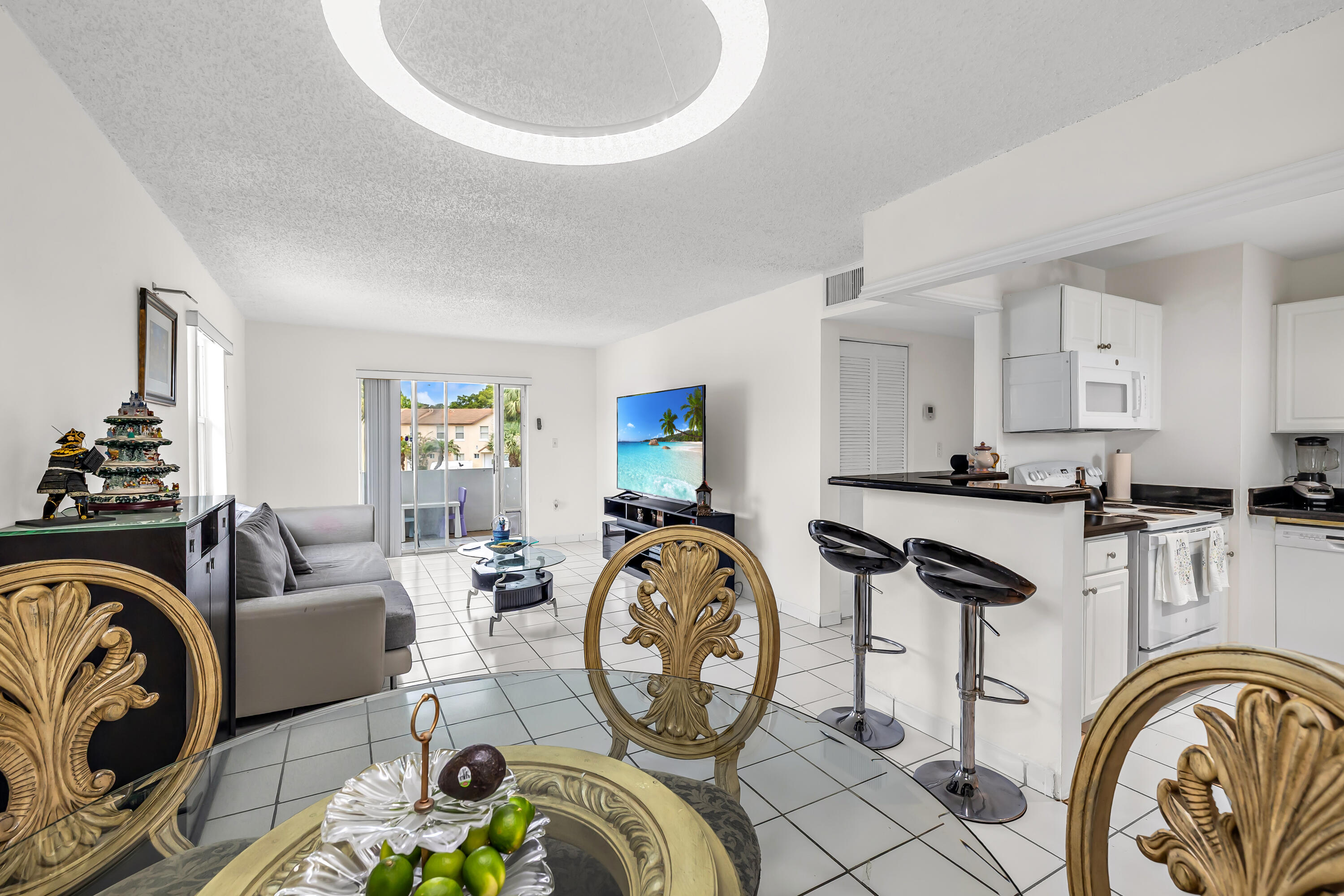 Welcome to this spacious and well-maintained 2-bedroom, 2-bath condo located in the heart of Margate! This all-ages community offers an excellent opportunity for both homeowners and investors alike. The unit features a functional floor plan with generous living spaces, abundant natural light, and plenty of storage throughout. Enjoy peaceful community living with access to two sparkling swimming pools, beautifully maintained grounds, and convenient proximity to shopping, dining, parks, schools, and major roadways. Whether you're looking for a primary residence, seasonal getaway, or income-producing property, this condo offers outstanding flexibility and value. Investor-friendly with strong rental potential, making it an attractive addition to any portfolio.  Conveniently located near everything South Florida has to offer while maintaining a quiet residential feel.  Don't miss this opportunity to own in a desirable community with resort-style amenities and excellent long-term potential!