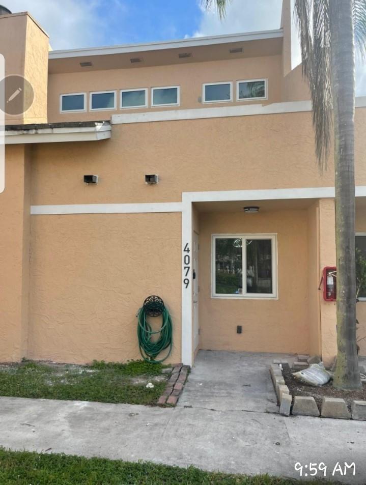The Haylofts of Coral Springs is a unique townhome/loft-style community, completely updated and freshly painted with 2 bedrooms, and 2 bathrooms with a canal view. The master bed with a spacious walking closet, washer and dryer stackable, and entrance to the private balcony are on the 2nd floor. The second bedroom and remodeled bathroom are on the 1st floor. The Kitchen has a new stainless steel refrigerator, stove, dishwasher & shelved pantry. Quartz kitchen countertop. Fireplace. Waterfront canal. Hurricane impact windows and doors. Exterior storage unit. Maintenance includes water, exterior insurance, roof, and common area.  Nearby parks, restaurants, shopping, Sawgrass Expressway All ages welcome. Pets under 25 lbs. Rentals allowed.