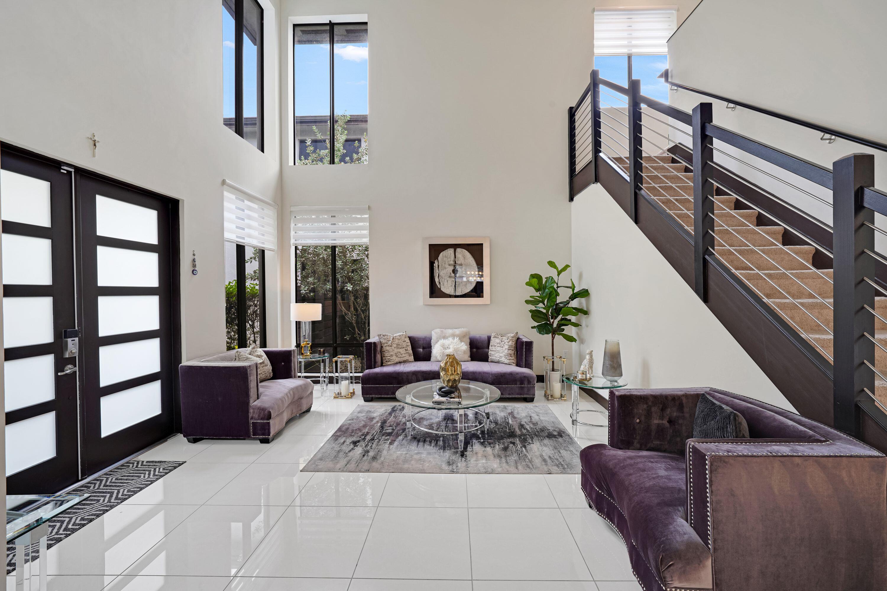 Located in the gated community of Satori, this beautifully maintained 4-bedroom, 3-bathroom home offers an open-concept floor plan with soaring 20-foot ceilings in the living room and abundant natural light throughout. The spacious layout is perfect for everyday living and entertaining. Enjoy South Florida living in the private fenced backyard featuring a salt water pool. New luxury vinyl hardwood floors on the stairs and upstairs. Satori residents enjoy access to a clubhouse, resort-style pool, fitness center, walking paths, and beautifully maintained common areas, all conveniently located near top-rated schools, shopping, dining, and major highways.