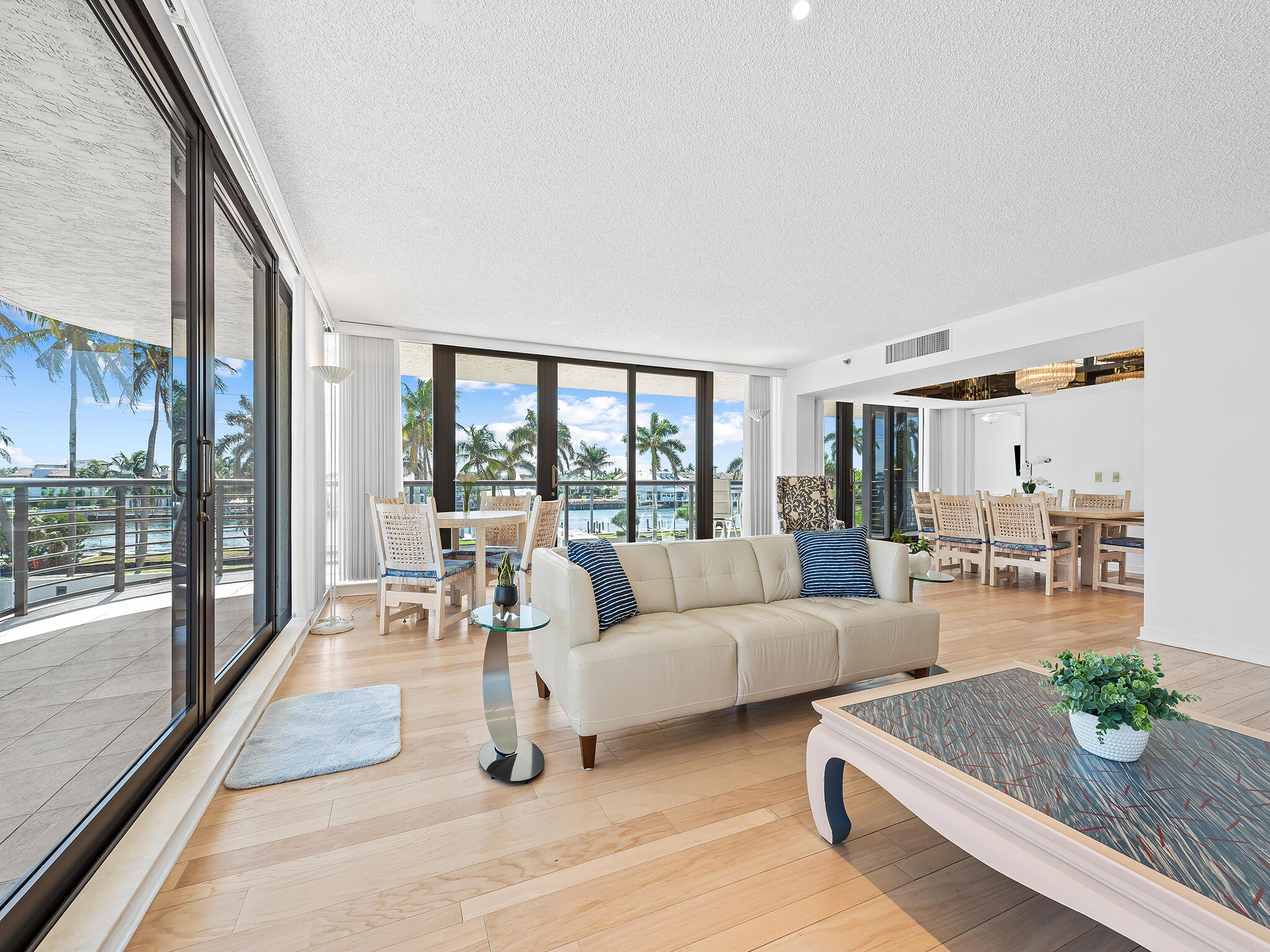 Come visit this special residence on the beach.  🏖️ This special 3 bedroom, 2.5 bath residence features both ocean and Intracoastal views, floor to ceiling glass doorwalls and windows, and a deep wrap around balcony accessible from all main rooms of the home!  2 parking spots - one covered carport and one garage.  This unit is part of a beautiful beachfront building that looks and feels fresh throughout.  The building celebrated recent completion of concrete restoration, installation of impact glass, balcony tiles, glass railings, painting, roof, pool and hot tub resurfacing, new pool tiles, lobby, landings, dockage and sea wall, upper deck and garage restoration, offices and restrooms, and social areas.  Check out the grills, wine lockers, & more - See tour links