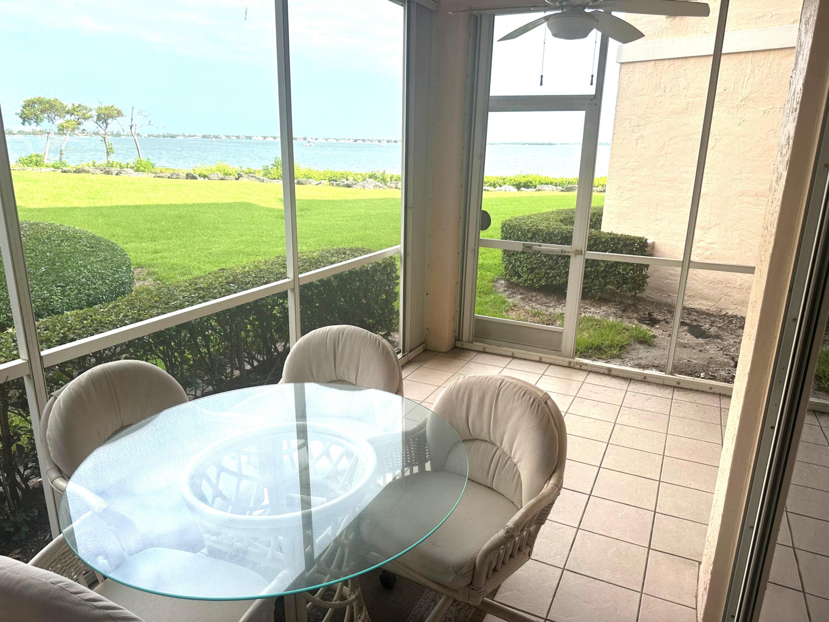 Discover effortless coastal living in this beautifully updated, furnished (with exceptions) Bayview condominium overlooking the wide Indian River in prestigious Indian River Plantation. This light-filled 2-bedroom, 2-bath residence features attatched storm shutters, covered parking, and the security of a private electronic gate. Enjoy breathtaking river views from your screened porch, where you and your dog will love the easy access to the expansive green lawn along the waterfront. Deeded beach access, a renovated clubhouse, heated pool, fitness center, BBQ area, golf, tennis, pickleball, Aqua driving range, marina, boat rentals... and multiple dining options from on the beach to lunch and dinner Restaurant's create an unmatched resort lifestyle.   .  Seller has a seasonal lease in place at $5,800 per month (January-March) that may be assumed by the buyer or canceled. Exceptional waterfront living, investment potential, and an unbeatable location all in one.