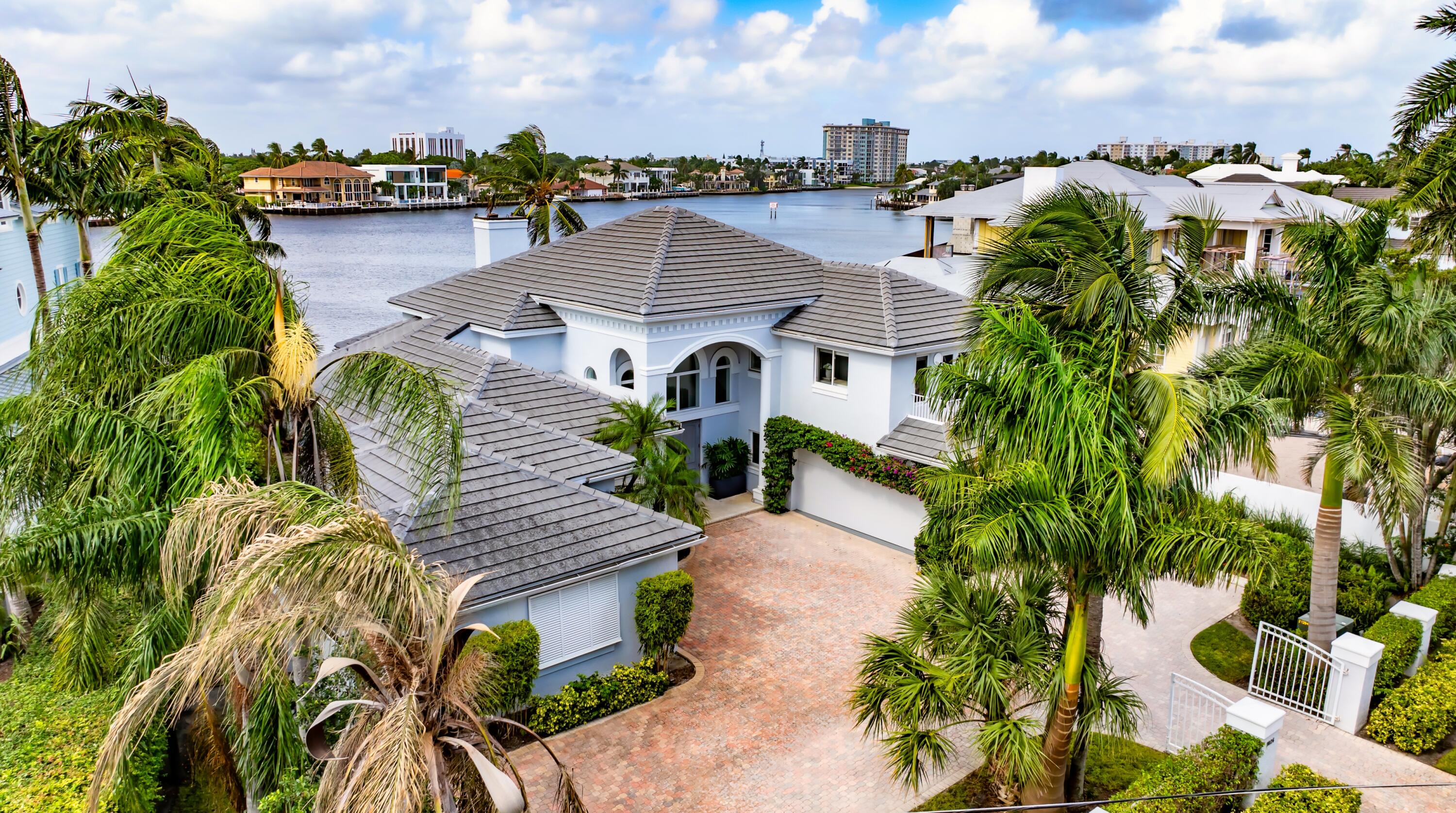 This luxe Seagate estate, with 50 feet fronting the Intracoastal, features beautifully appointed interiors that integrate seamlessly with the outdoor entertaining area, where the loggia overlooks the pool and dock. Newly installed wide-planks wood floors flow throughout, while the meticulously renovated kitchen and bathrooms elevate this stunning residence to the pinnacle of South Florida living LOCATION: 

1026 Seasage Drive, Delray Beach, Florida.  Fringed by the ocean's sugar sands in Old Florida beauty, Seagate is a sought-after beachside neighborhood located only about a mile south of famous Atlantic Avenue, the centerpiece of historic downtown Delray Beach's vibrant shopping, dining, and culture. In the heart of South Florida's Gold Coast, between Boca Raton and Palm Beach, Delray Beach is known as a charming village-by-the-sea and a resort destination featuring pristine "Blue Wave" beaches.


PROPERTY: 
 
Making a grand first impression, the brick-paved motor court flows through the front gate of the walled tropically landscaped front yard to the entry, which is flanked by two garages accommodating three cars. For backyard entertaining, the covered loggia overlooks the heated pool, set within a new paver patio, and perfect for boaters with 50 feet on the Intracoastal Waterway, the composite 30-foot dock can accommodate a vessel up to 50 feet.

RESIDENCE: 

Presenting as a serene oasis of incomparable waterfront luxury, this four-bedroom, Coastal Contemporary estate, encompassing 5,288 +/- total square feet,  captivates. With sweeping sunrise views of the Intracoastal Waterway, this architectural gem merges modern splendor with a relaxed yet refined ambience. Newly installed wide-planks wood floors flow throughout, while the meticulously renovated kitchen and bathrooms elevate this stunning residence to the pinnacle of South Florida living. Its open-floorplan configuration places major rooms radiating from the living room, making water views the essential highlight of almost every room. Immediately upon entry into the two-story living room, gorgeous Intracoastal views dazzle. Anchored by a natural fireplace with a decorative stone mantel that exude warmth and sophistication, the living room features impact-glass sliding doors that open to the Intracoastal-view pool patio, while  clearstory upper windows add to the room's  light, bright, airy ambience and modern aesthetic. The chef's kitchen, a sleek fusion of espresso-finished wood cabinetry, black-quartz countertops and professional-grade stainless-steel appliances, centers on a large cook-island accommodating pull up seating for effortless entertaining. The adjacent dining area, surrounded by glass windows and doors, invites al-fresco repasts with its seamless transition to the water-view patio. Also open to the living area is an inviting sitting room, and accessed from a private office, the main floor boasts a luxurious primary suite, comprising two spa-inspired bathrooms and three walk-in closets fitted with custom cabinetry topped by quartz counters. Also downstairs are a guest bedroom suite and a laundry room. Upon ascending to the second level,  a guest bedroom suite flows out to a private Intracoastal-view balcony, where a circular stairway descends to the pool patio. Also on this level is another luxurious guest bedroom suite with a garden-view balcony. Every aspect of this residence is carefully curated for comfort and security, with amenities that include impact windows and doors, three air conditioners and a comprehensive alarm system. Set amidst lush tropical surroundings, this incredible estate exemplifies the utmost in luxury waterfront living. 

The information herein is deemed reliable and subject to errors, omissions or changes without notice.  The information has been derived from architectural plans or county records. Buyer should verify all measurements



DISCLAIMER: Information published or otherwise provided by the listing company and its representatives including but not limited to prices, measurements, square footages, lot sizes, calculations, statistics, and videos are deemed reliable but are not guaranteed and are subject to errors, omissions or changes without notice. All such information should be independently verified by any prospective purchaser or seller. Parties should perform their own due diligence to verify such information prior to a sale or listing. Listing company expressly disclaims any warranty or representation regarding such information. Prices published are either list price, sold price, and/or last asking price. The listing company participates in the Multiple Listing Service and IDX. The properties published as listed and sold are not necessarily exclusive to listing company and may be listed or have sold with other members of the Multiple Listing Service. Transactions where listing company represented both buyers and sellers are calculated as two sales. "No payments made until title passes" Some affiliations may not be applicable to certain geographic areas. If your property is currently listed with another broker, please disregard any solicitation for services. Information published or otherwise provided by seller, listing company or its representatives is deemed reliable but are not guaranteed and subject to errors, omissions, or changes without notice. Copyright 2025 by the listing company. All Rights Reserved.