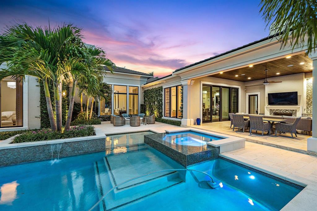 Travel down the prettiest palm tree lined street in the Palm Beaches to get to this spectacular residence in the hottest golf course community in South Florida. Old Palm will be called home and this 5356 sq ft home will be where you will rest your head. 4 bedroom, 5.2 bath and four car garage will allow you to live here full time or as your vacation home. An office, theater, entertaining bar area are just some of the extras. An amazing view of the 17th hole is the ultimate bonus as you enjoy your expansive outdoor living area with summer kitchen and phantom screens. Come see what this community has to offer and finally start to live the life you have always wanted to​​‌​​​​‌​‌​​​‌‌​​​‌‌‌​​‌​​‌‌​​​​ live.