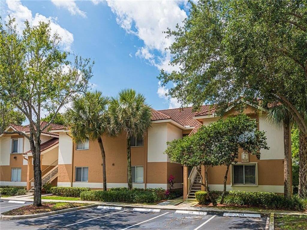 This rarely available Colonnades corner 2/2 features a second-floor split floor plan, bright and airy, separate laundry area with a new full-size washer and dryer, and a screened patio with extra storage space. This community offers a pool, clubhouse, and gym. Central Park is located just across the street for pickleball, basketball, tennis, walking trails, exercise, or a picnic. It's only 10 minutes to the world-famous Sawgrass Mills Mall for shopping and upscale dining, 20 minutes to Fort Lauderdale International Airport, and the white sand beaches. The property includes two designated parking spots and can be rented out immediately upon purchase. Motivated seller!  Agents for showing please go to Showing Time to schedule appointment