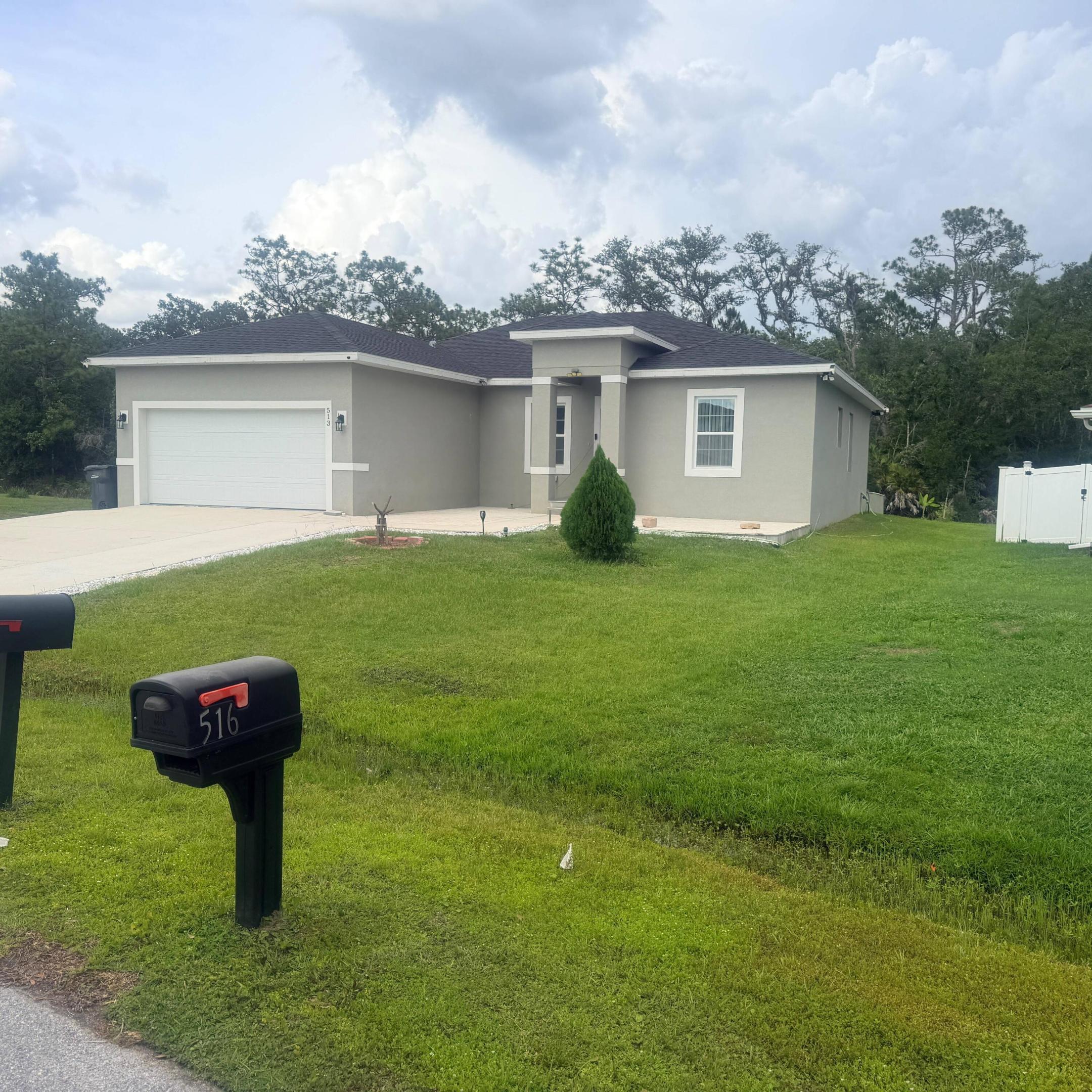 Welcome to this beautifully crafted 4-bedroom, 2-bathroom single-family home nestled in the desirable Poinciana community. Built in 2022, this modern residence with open layout plan is a must! All porcelain tile floors, no carpet here!!Oversized driveway for 4 cars and attached 2-car custom Garage with A/C and porcelain tile floor, and a beautiful patio, more than $27K in upgrades! With proximity to world-class attractions like Disney World, abundant natural beauty, outdoor recreation opportunities, and a diverse, welcoming community. Whether you're seeking a peaceful retreat or an active lifestyle, this property delivers it all.Don't miss your chance to own this gem in one of Central Florida's hidden treasures. Contact us today for more details or to schedule a viewing!