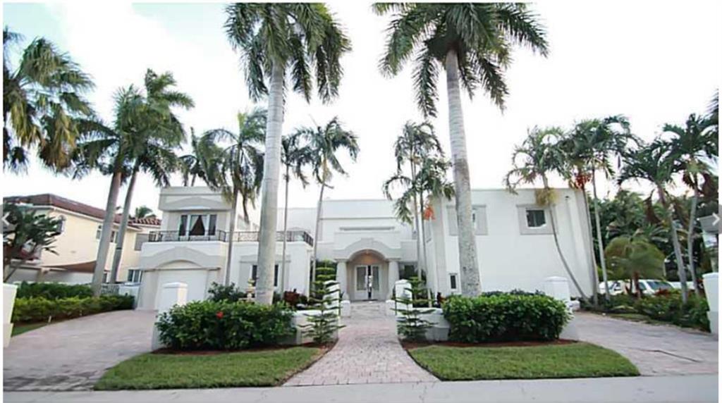 Intercoastal water front, Two story mansion located in the intercoastal of Hollywood, FL 5 bedrooms and 6.5 baths, over 9361 sf. 100 ft sea wall, 50 feet boat dock. 1/2 acres lot. Huge outdoor stairs and back yard. High ceiling foyer, gourmet chefs kitchen, state of the art kitchen-fireplace-bar/marble and wood floor/ Staircase, Elevator, balconies, covered outside pavilions, pool, spa cabana. Lush grounds with tropical plantings and trees. Private Dock, U shape driveway. Conner lot property. Sell as is condition.