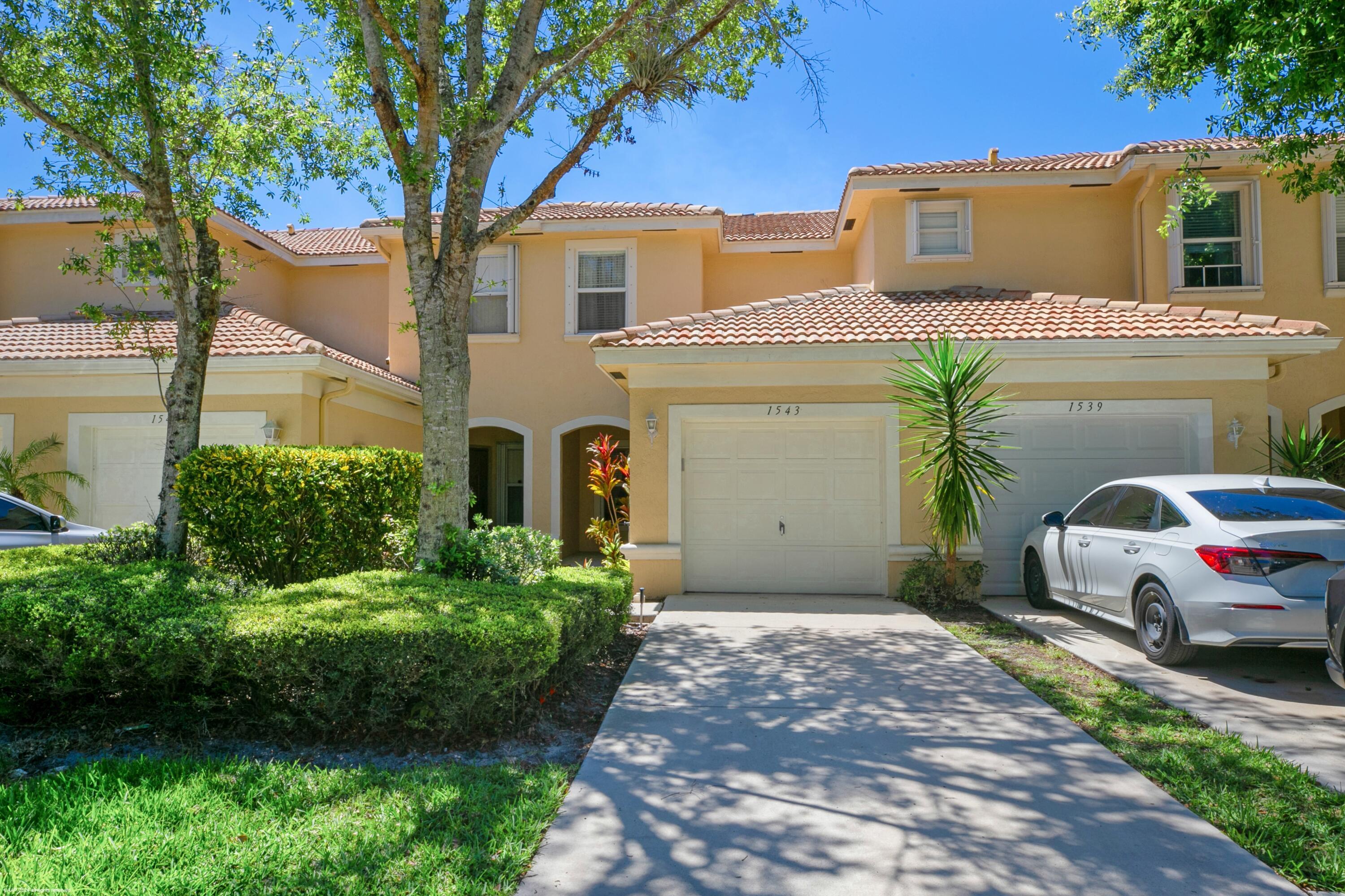 **Updated Townhome with Dual Primary Suites** Available seasonally or annually. Renovated townhome featuring two primary suites plus laundry upstairs, with common areas, a powder room, and a screened patio on the first floor. Includes attached 1-car garage plus 1 space in driveway and community pool access. Conveniently located just 2 miles from Wellington International. Pets permitted with HOA & LL approval. Walking and biking distance to brand new Publix, banks, restaurants and shops. Don't miss this one! $4,500/month furnished seasonal; $3,100/month furnished off-seasonal or annual.