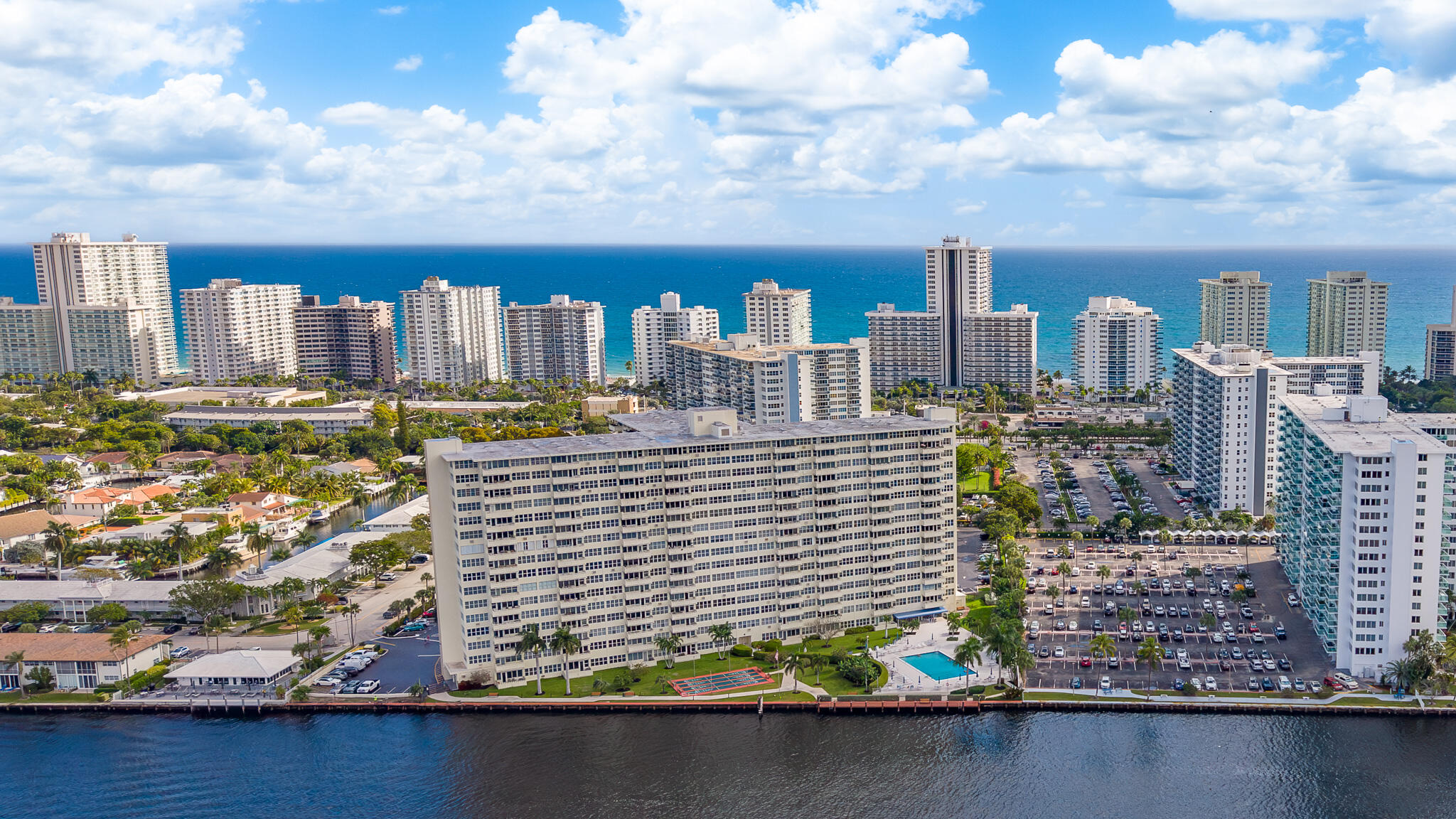 Water, Spectacular Panoramic Intracoastal view from every room. Immaculate 800 Sq Ft, move in condition,1/1 Private Open balcony, Pool 30 x 60 heated, Resort-Like Amenities ,fitness Center,   Library, community room, shuffleboard, library, BBQ Area, car wash, Bike Storage, EV Charging,24/7 Security, manager on premise, Walking distant from the Beach, Grocery, Pharmacy, Shops, Restaurant, internet, Fob entrance Own Owner 55+ No Pets, No Leasing. 40-Year inspection completed, new Sprinklers & Fire alarm. No pending Assessments. Annual income $58,000