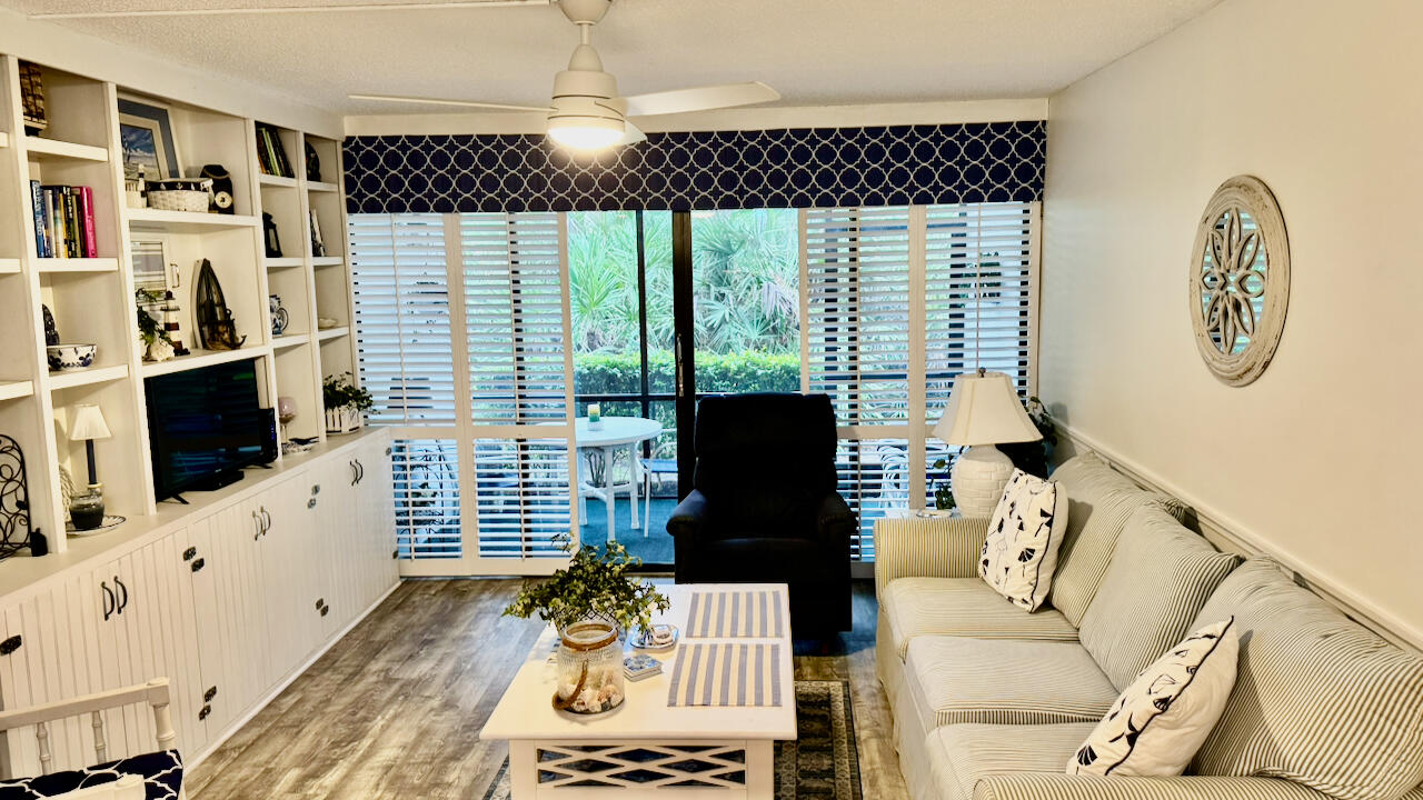 Experience the ultimate coastal lifestyle in this fully furnished 1-bed, 1-bath first-floor condo in the highly desirable Golf Villas at Ocean Village on South Hutchinson Island. This bright 678 sq ft unit offers easy no-stairs access, an open living/dining layout, plantation shutters, wood-look floors, and a private patio. Perfect as a turnkey vacation retreat or permanent paradise with flexible rental options. Located in a 24-hour guard-gated oceanfront community, residents enjoy 3,000 feet of pristine beach, a 9-hole par-3 golf course, heated pools, tennis, pickleball, a fitness center and endless activities.