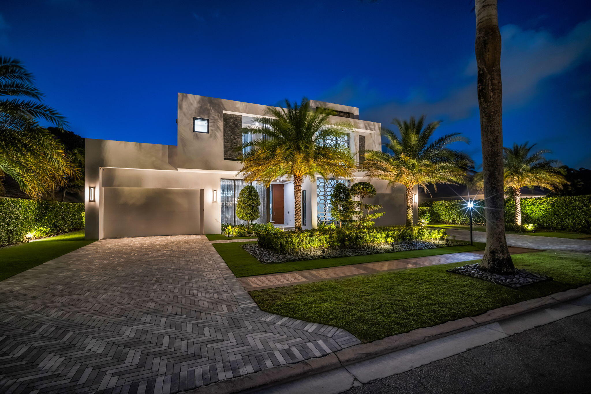 Modern/ Transitional Luxury Estate Pool Home built 2022 on the golf course in prestigious St. Andrews C.C. Boca Raton. This custom home offers everything. 5 bedrooms, 6 bathrooms, 2 powder rooms, gourmet kitchen, office, family room, huge great room, wrap around bar, 2 bathrooms & 3 custom closets in primary bedroom located downstairs, floating glass staircase, resort style pool, 4 car garage, outdoor kitchen, full house generator, beautiful landscaping with lighting and so much more. If you love to entertain this is your dream home. Blink and it will be gone. Modern/ Transitional Luxury Estate Pool Home built 2022 on the golf course in prestigious St. Andrews C.C. Boca Raton.