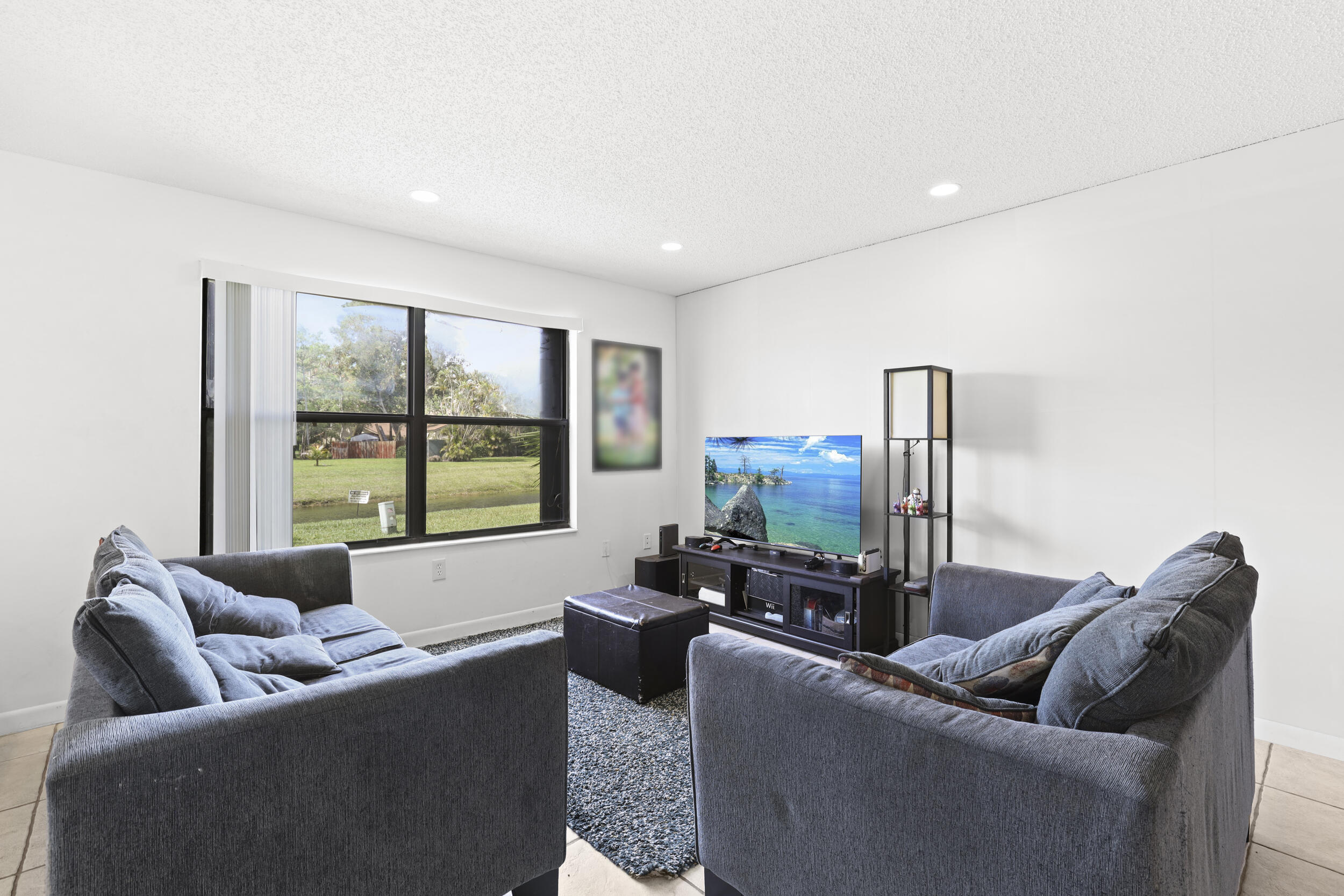 SHEFFIELD WOODS AT WELLINGTON CONDO - Residential