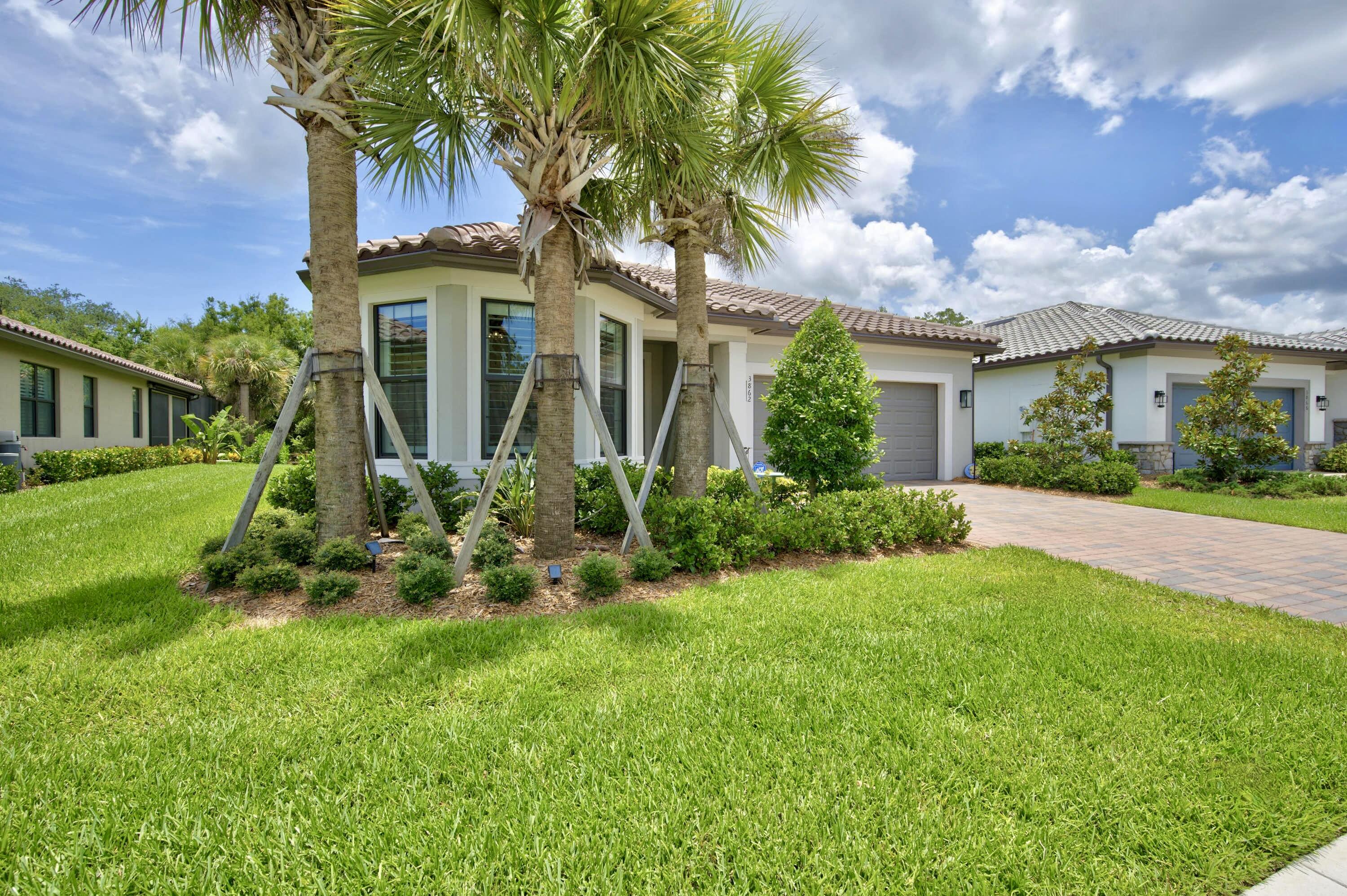 SOME HOMES SIMPLY EXCEED EXPECTATIONS. Thoughtfully designed from the outset, this home showcases extensive premium builder upgrades enhanced by curated post-construction enhancements blending coastal elegance with relaxed comfort. 3BR split fl-plan, 2.5BA, 2-car gar. Nearly 2,900 gross sf. BUILDER UPGRADES: PRESERVE HOMESITE with near wall-to-wall views of the serene, private tropical preserve through TWO sets of TRIPLE SLIDERS, IMPACT WINDOWS/DOORS, ROOFLINE-extended covered screened lanai,  Level 5 Calacatta Gold quartz countertops, Level 4 cabinetry and Level 3 porcelain tile flooring throughout+. POST-CONSTRUCTION: TWO CUSTOM PANTRIES, PLANTATION SHUTTERS, MOTORIZED SHADES, DESIGNER LIGHTING+ more enhancing everyday living. Must-see video. Then experience it in person!