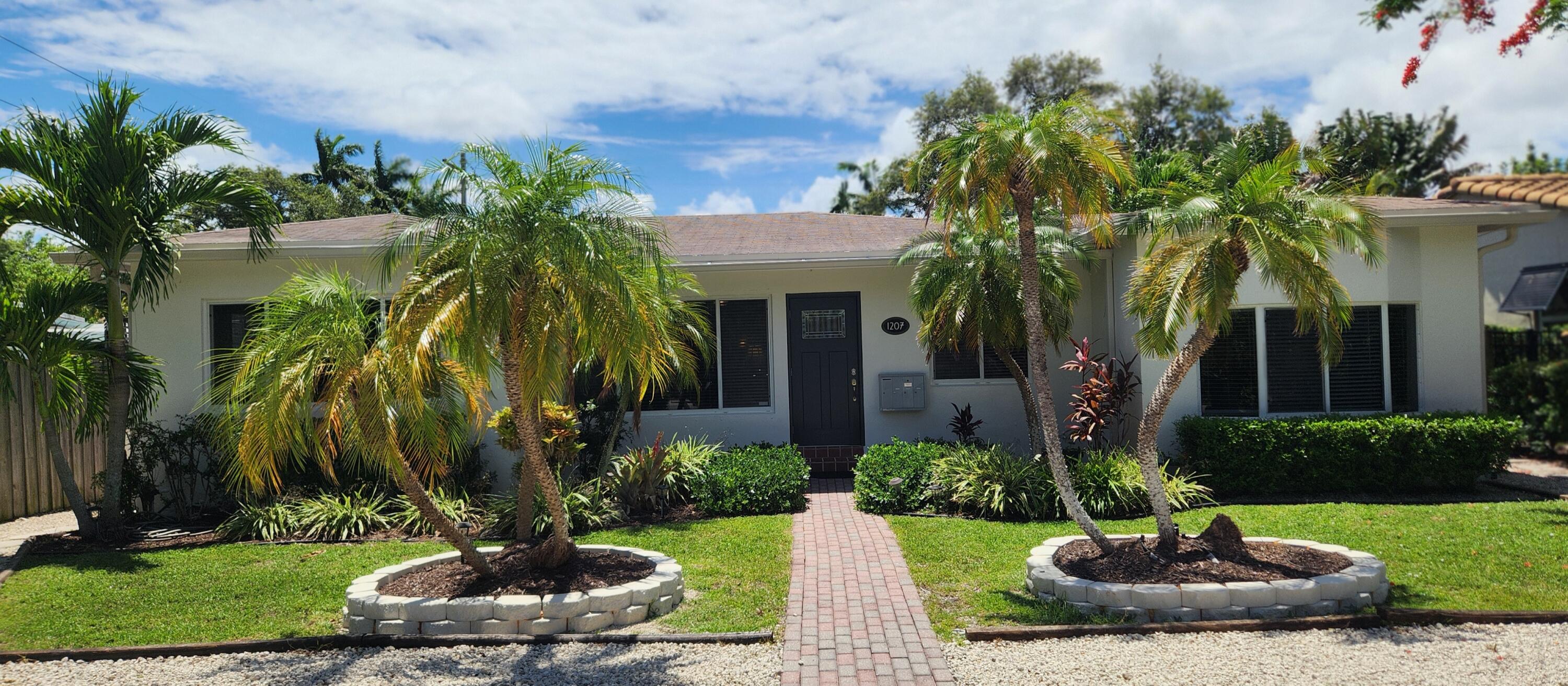 Investor's dream opportunity just 2 miles to Ft. Lauderdale Beach! Fully furnished & equipped triplex in the quiet nook of Lakeridge  (East Ft. Lauderdale) optimized for substantial income potential. This stunning 4-bedroom, 4-bathroom triplex (2/2,1/1,1/1) spans~3,044 sq ft & is zoned multi-family.  Numerous possibilities; live-in, rent-out, AIRBNB, or do a bit of each! Offered AS-IS, fully furnished/equipped w/décor, linens, dinner/flatware, appliances, BBQ grills & more. Super clean property w/3 electric meters, 3 gorgeous, landscaped, private, fenced (or partially fenced) yards, separate front & rear entrances for each unit & dedicated off-street parking for each unit. Zoned RM-15 for future development options; this is primed for profit.*Disclosure: Listing agent related to owner. Three separate units with additional flex-space/value-add large storage room in Unit #3 w/possibility of conversion into another bathroom, walk-in closet, or small gym (See floorplan).  With fresh exterior paint, beautiful landscaping, brand-new attic insulation, and outdoor storage, this property is amazing and primed for profit and ease of ownership.  Explore AIRBNB, VRBO, or short-term rentals for enhanced return on investment.