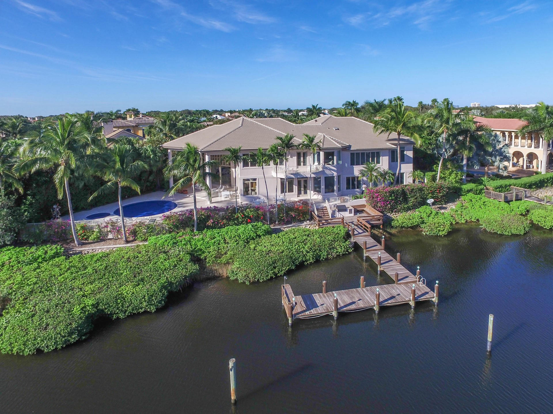 Truly amazing waterfront views from this spectacular, 8,000 square foot, 7BR/8½BA home in the highly sought-after community of Admirals Cove. This architecturally significant home has been designed to provide the ultimate in enjoyment from the waterways leading into the Intracoastal Waterway with incredible sunset views. Admirals Cove is one of the finest private gated communities in Palm Beach County and one of Florida’s premier golf and yachting addresses. Residents have backyard docks & Atlantic Ocean access available with over 6 miles of winding inland waterways. Admirals Cove also has its own deepwater 74-slip marina, marina shop, and marina cafe. In addition, Admirals Cove has 45 holes of championship golf.