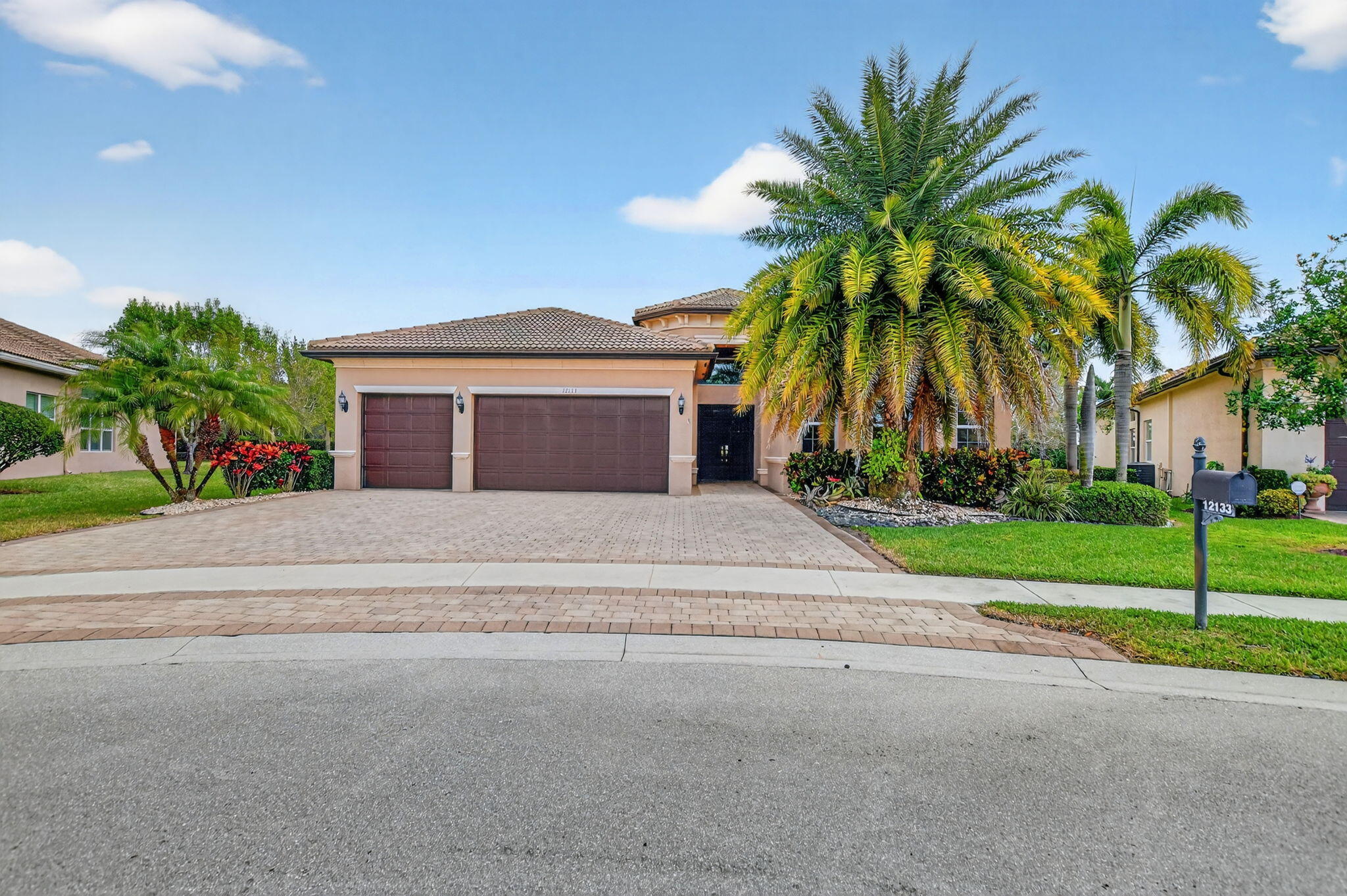 Welcome to Valencia Cove, one of Boynton/Delray Beach's premier 55+ resort-style communities. 12133 Glacier Bay Drive offers a beautifully maintained 3-bedroom, 3-bath, clubroom-office waterfront home with a desirable split floor plan, an Oversized driveway, and a large lot. Light-filled living spaces are perfect for entertaining or everyday comfort. Etranquil water views, a multiple-car garage, a full-house generator, a 2024 hot tub for relaxing, and newer A/C 1.5 years old. One-year home warranty included. Valencia Cove offers a clubhouse, fitness center, resort-style pool, tennis, pickleball, and vibrant social amenities. This coveted location offers the best of both worlds Delray's vibrant coastal lifestyle and Boynton Beach's upscale residential charm. Come View and Fall In Love!