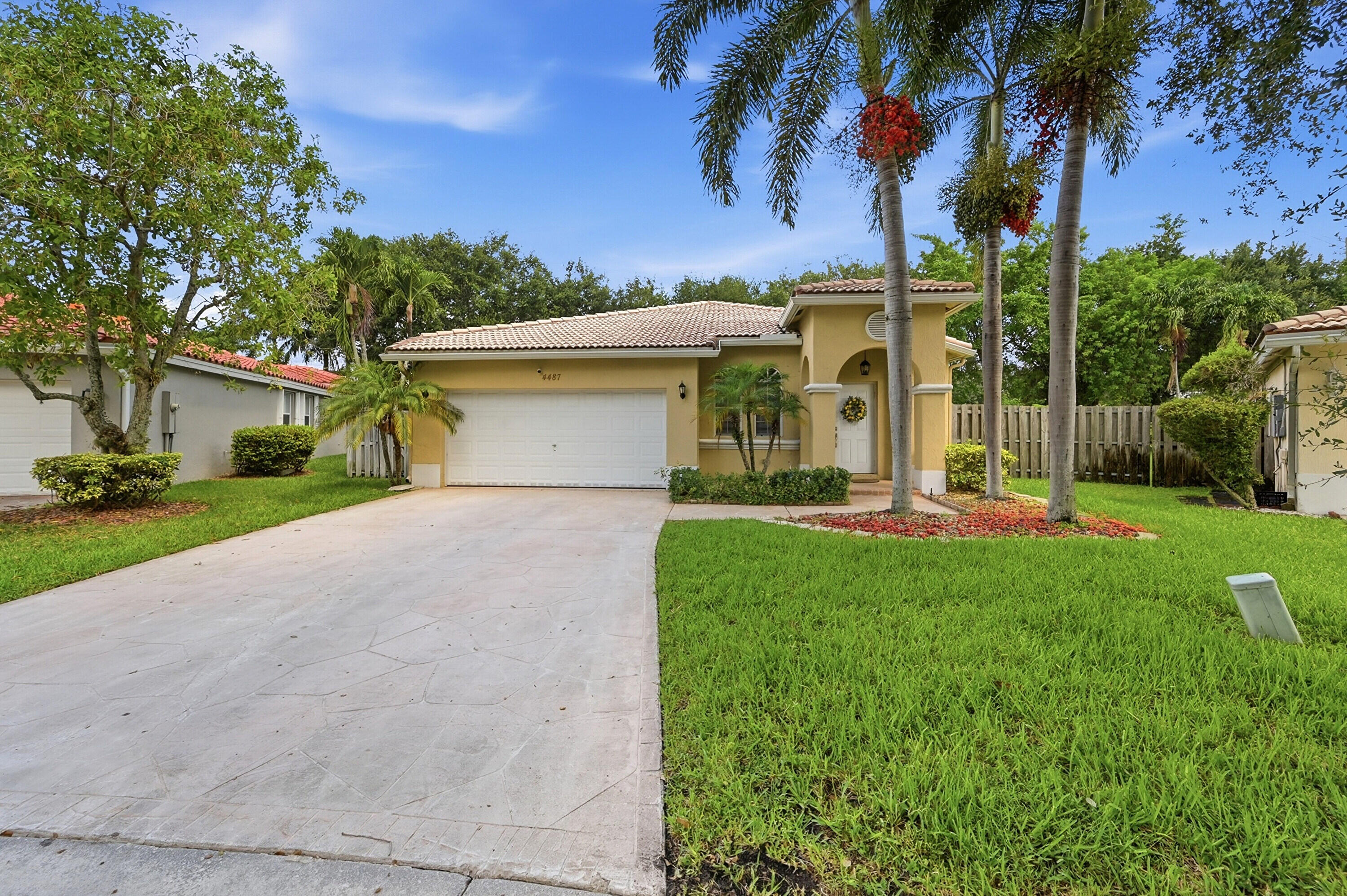 Beautifully Updated Pool Home in Coconut Creek, in Gated Coquina! Nestled on a spacious pie-shaped lot, this inviting 3-bedroom, 2-bath home offers the perfect blend of comfort and style. The updated kitchen features white shaker cabinets, stainless steel appliances, granite counters and a functional layout ideal for everyday living and entertaining. Enjoy your own private backyard retreat with a sparkling screened-in pool, a patio perfect for a fire pit and outdoor gatherings, and several fruit trees. Partial impact windows & full hurricane protection w/ low cost insurance. Conveniently located near shopping, dining, and entertainment, this move-in-ready home is one you won't want to miss! Top rated schools, walk across the street to the Promenade mall. HOA includes internet, Cable, Community Pool, play ground, common area and gate for your security.