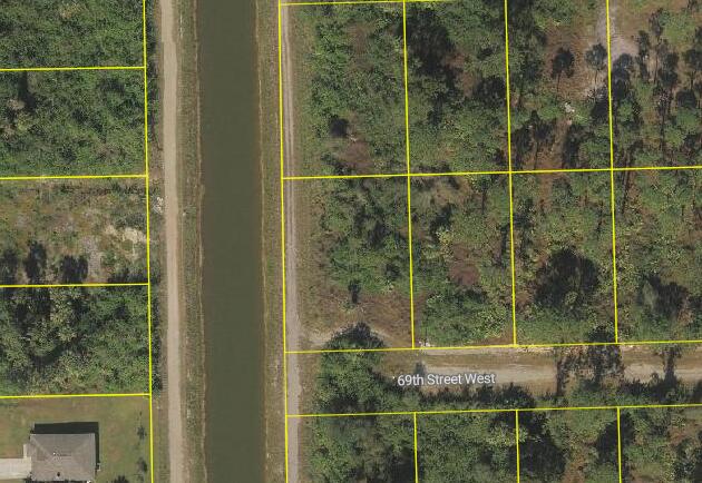 A Big Vacant Residential Lot, measuring .3129 Acres (13631 SF) Located in a growing area of Lehigh Acres. This oversized lot offers an ample opportunity for you to build your dream home. Please, don't miss out on this great deal in a desirable community of Lehigh Acres.