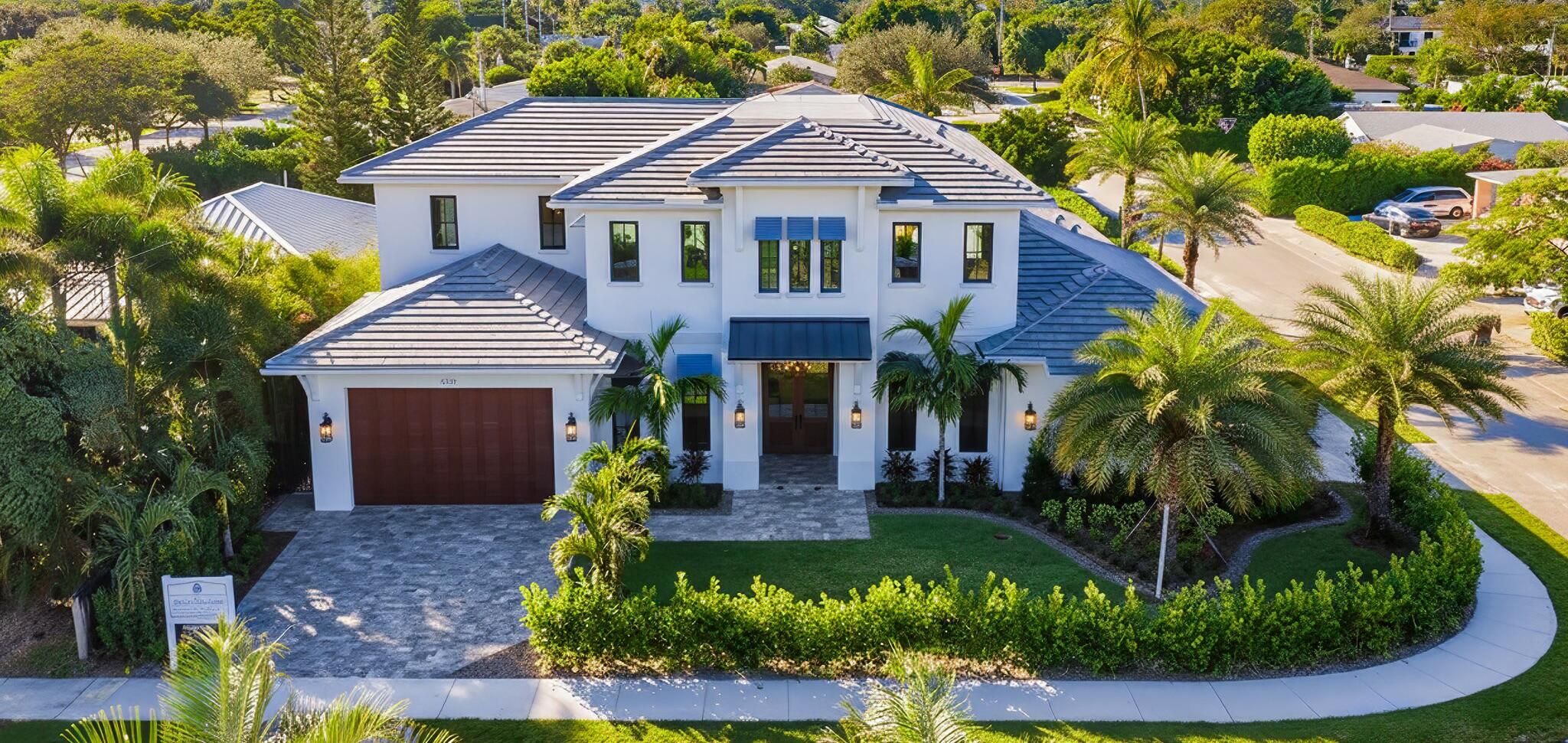 Experience exceptional quality and refined design in this new coastal transitional home. Featuring  4bed/5 baths, a 3 car garage set for 2 charge ports, private office, mudroom, walk in pantry, and a laundry room on each floor. This home blends style and function seamlessly. The first-floor primary suite includes dual walk-in closets, luggage storage, and a linen closet.  Enjoy a spacious upstairs family room with morning bar and large balcony with sunset views. Beautiful outdoor kitchen, pool with sun shelf, spa, and outdoor shower. This home has tons of storage for your family.  Situated within walking to infamous Flagler Drive & minutes from Downtown West Palm Beach, Palm Beach Island, PBI Airport, the unique Antique Row district, and an array of upscale restaurants and boutiques, this prime location offers an incredible opportunity to live in your dream home in the most desirable and rapidly growing neighborhood in West  Palm Beach.