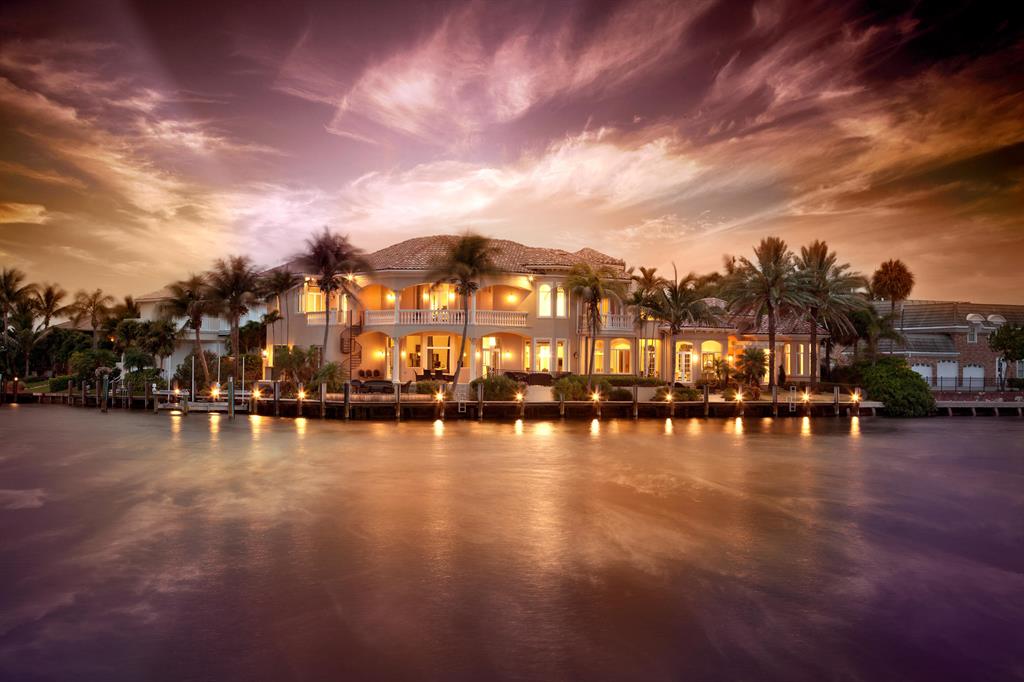 The most amazing Southeast Point on the Direct Intracoastal. Completely remodeled, featuring designer decor, state of the art theater, chefs kitchen, impact glass, sweeping water views from every room, guest house, and huge dockage, very close to the inlet.