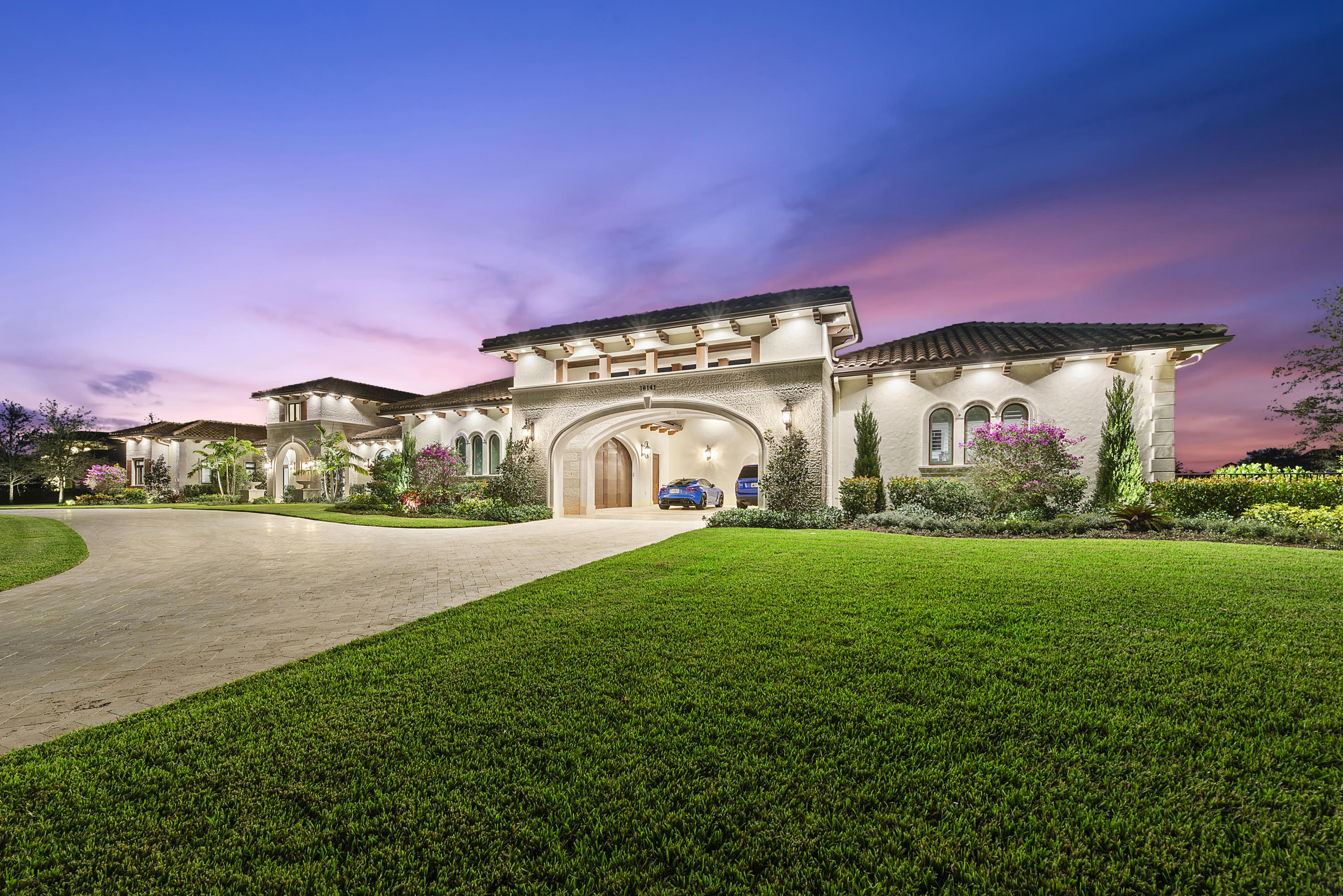 Welcome to Stone Creek Ranch, one of the most exclusive and sought-after communities in Palm Beach County. 16141 Quiet Vista is an impeccably custom built estate that elegantly represents the luxurious lifestyle for those with sophisticated tastes. 

The estate features 4 spacious bedrooms, 5.1 bathrooms, an office, formal dining room, custom gym, an out-of-this world game room, wine collection room, custom movie theatre, full summer kitchen and pool with cascading waterfall. 
The living room is elegantly decorated with a floor-to-ceiling granite fireplace and custom built bar for gracious entertaining. Natural light pours in from the soaring windows, enhancing the light and bright feel from the volume ceilings. The chef's gourmet kitchen provides an incredible space for entertaining and includes top-of-the line appliances.
The master bedroom overlooks the lake and includes 2 spacious custom closets, a master bath with impeccable marble flooring, dual sinks and separate tub and shower. 
Beautiful Soho marble compliments the main living areas and Italian wood plank porcelain is laid in all four bedrooms.
The custom arcade room, unlike any other, includes a 2 lane bowling alley, collectible pinball machines, regulation racquetball court/walley ball court, golf simulator, full concession stand, custom bar and 12 seat movie theatre. 
This residence comes fully equipped with the latest Smart Home technology â€“ Savant lighting, state-of-the art security and audio systems. 
The gracious outdoor living area overlooks the serene lake and features a pool with a cascading waterfall, full summer kitchen, and lush landscaping to enjoy the beautiful Florida weather. 
This is the ultimate home for modern living.