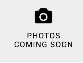 Pictures coming soon! Welcome to this beautifully maintained gated community. This spacious residence features an open floor plan, a large eat-in kitchen with an updated center island, built-in wine storage, a convenient lazy susan and new appliances (2025).  This home has been updated with a new A/C (2025), washer and dryer (2025), accordian shutters and neutral vinyl flooring upstairs. A generous laundry room and an oversized walk-in closet downstairs provide exceptional storage and convenience. Step outside to your quiet backyard featuring a screened-in patio with extended pavers and a variety of mature fruit trees. Don't miss this incredible opportunity to make this your next home!