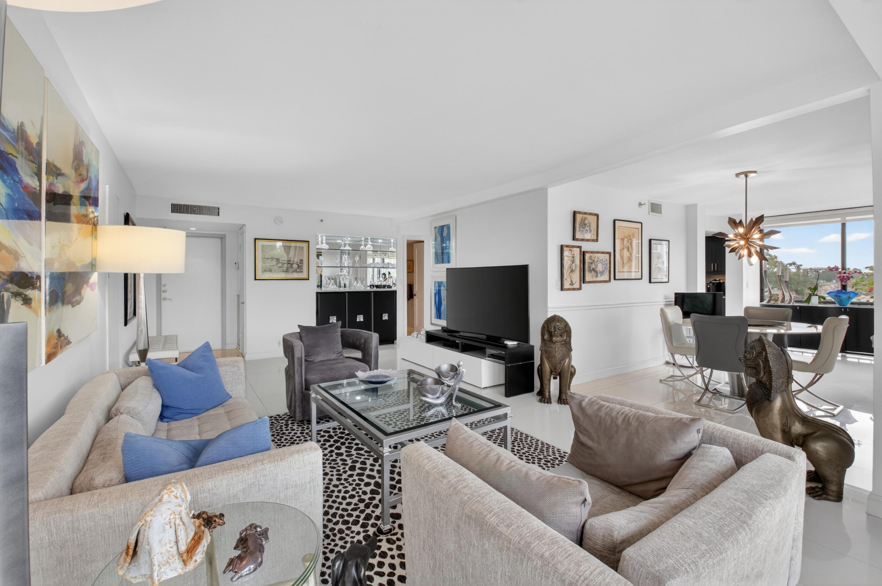 Move right into this  renovated and expanded 2 BR, 2 BTH condo located in the award-winning Boca West Country Club. This residence offers the rare advantage of two assigned parking spots, including one highly coveted covered spot. This bright and inviting interior has been thoughtfully updated, creating a stylish and comfortable living space that's ready for immediate enjoyment. Enjoy all that Boca West has to offer, including world-class golf, tennis, pickleball, fitness facilities, fine dining, and an unmatched social lifestyle. Don't miss this opportunity before the club joining fee increases on October 1st.  Mandatory Joining Fee: $150,000, BWMA Capital Contribution: $10,000, Annual Social Dues: $24,454. *Club's Joining Fee & CC will be increasing by $75,000 on October 1st. Act now to beat the increase!