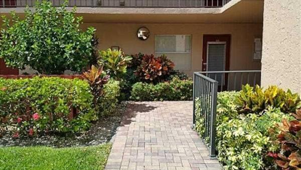 PALM LAKES 1ST GROUND FLOOR CONDO! 1 Bedrm 2 full baths.  PHOTOS SHOW WHAT IT WOULD LOOK LIKE WITH NEW CARPET. Furnished photos have been staged with AI. 2nd building from Atlantic Blvd., 1/3 mile walk to Publix,bank,shops. Large rooms, QUALITY FAUCETS, FRIDGE, SHOWER DOORS. Jalousy front door for breeze. Under cover mailbox. Dumpster room, behind the mailboxes. Parking spot directly in front. WASHER DRYER IN UNIT, doors have locks in house allows 2 to share unit yet have private areas,exercise rm, game rm, ping-pong,pool tables,tennis courts,clubhouse ballroom w kitchen,2 pools,jacuzzi.55+,no under 18 yrs, SENIOR COMMUNITY PALM LAKES 650 CREDIT SCORE, MONTHLY HOA $700. $5000 OFFERED AT CLOSING PAID BY SELLER! SELLER FINANCING AVAILABLE WILL WORK WITH YOUR FINANCIAL SITUATION W MONEY DOWN