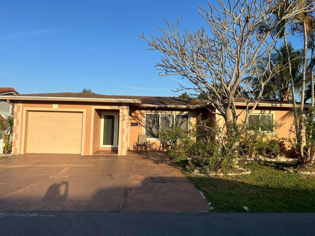Welcome to this thoughtfully designed single-story all age residence in the Mainlands of Tamarac Lakes community in Tamarac, Florida. This two-bedroom, two-bathroom home offers 1,660 square feet of finished living space, providing comfortable proportions for everyday living. The two-car garage has been converted to a 3rd bedroom or rental room. Located within the established Mainlands of Tamarac Lakes subdivision, this property presents an opportunity to own a straightforward, well-located residence in the area with nearby hospitals, high-ways and shops.  A 24-hour showing request is needed; the agent must accompany the buyer.