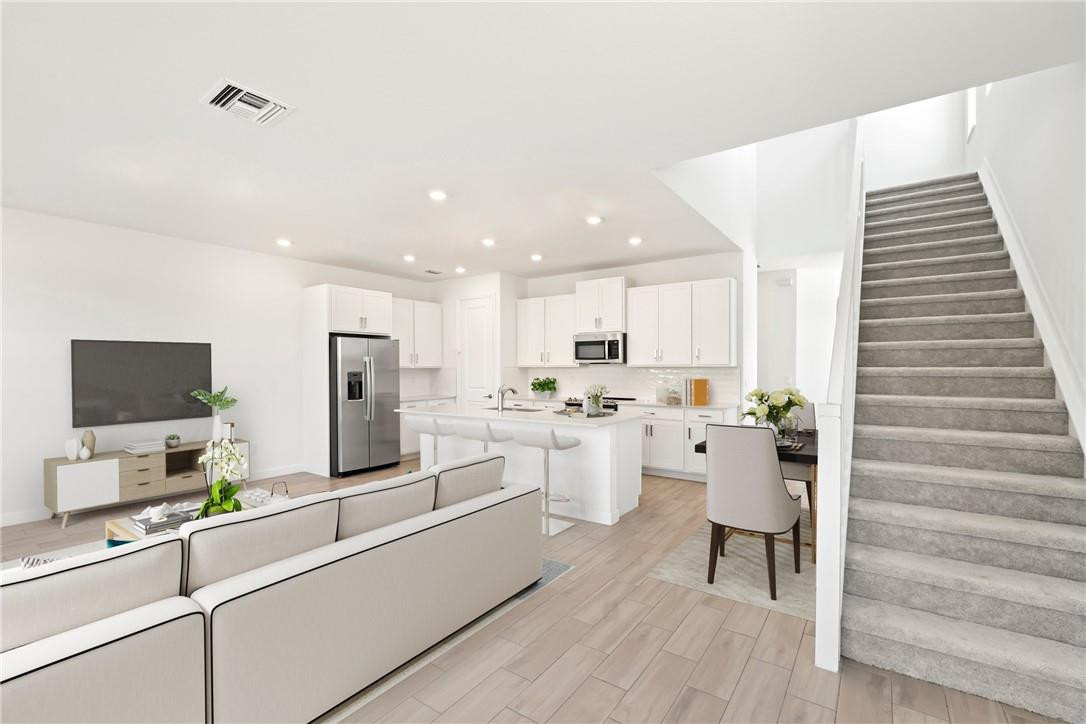 Price reflects a 15 month lease. Discover all that awaits at this new construction single family homes. This state of the art modern home with pond views offers gourmet kitchens with stainless steel appliances, a full-size washer and dryer, walk-in closets and impact windows with custom roller shades. Wood grain porcelain tile in main areas. Luxury tiled bathrooms with frameless shower enclosures. The community offers low move in cost and fast approvals. Throughout the community, residents can take advantage of amenities like the resort-style swimming pool, elegant clubhouse, and fully equipped fitness center. Prices subject to change daily based on community availability.