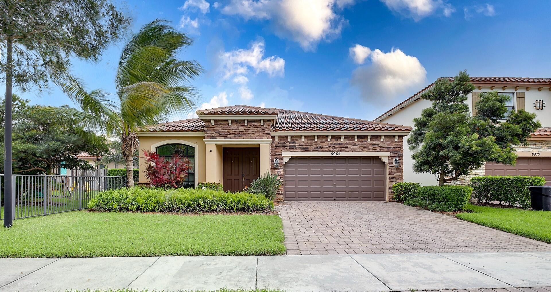 Welcome home to this desirable gated community with amenities. A great location near shopping, restaurants, the 441/Wellington Mall corridor plus it offers A-rated schools nearby. Spacious tiled formal and family areas, open modern kitchen, half bath for guests, laundry room, all appliances and panel shutters for storm protection. See photo's and documents for the floor plan and HOA rules. Pets on a case by case basis subject to landlord approval. Lawn care and amenities included in the rent. Please note commercial vehicles, trucks or motorcycles must be garaged.