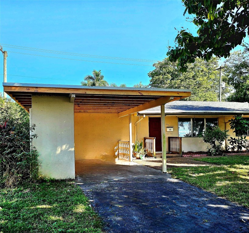 Incredible opportunity to purchase this waterfront 2/2 with carport. NO HOA!!! Sought after Plantation neighborhood. BRAND NEW ROOF just completed. Newer plumbing. Spacious living area, split bedroom floor plan, 2 full baths, full size laundry room, formal dining area & breakfast bar. Terrazzo floors, and picture windows to fenced yard that could be expanded further. Carport storage closets with hurricane protection. Within Historic Plantation, and only minutes to downtown Ft Lauderdale, all the major highways, Nova University and top rated schools. Attached home with its own separate folio. Same owner for many years, ready for new family to lovingly care for and call home and/or great rental investment property.