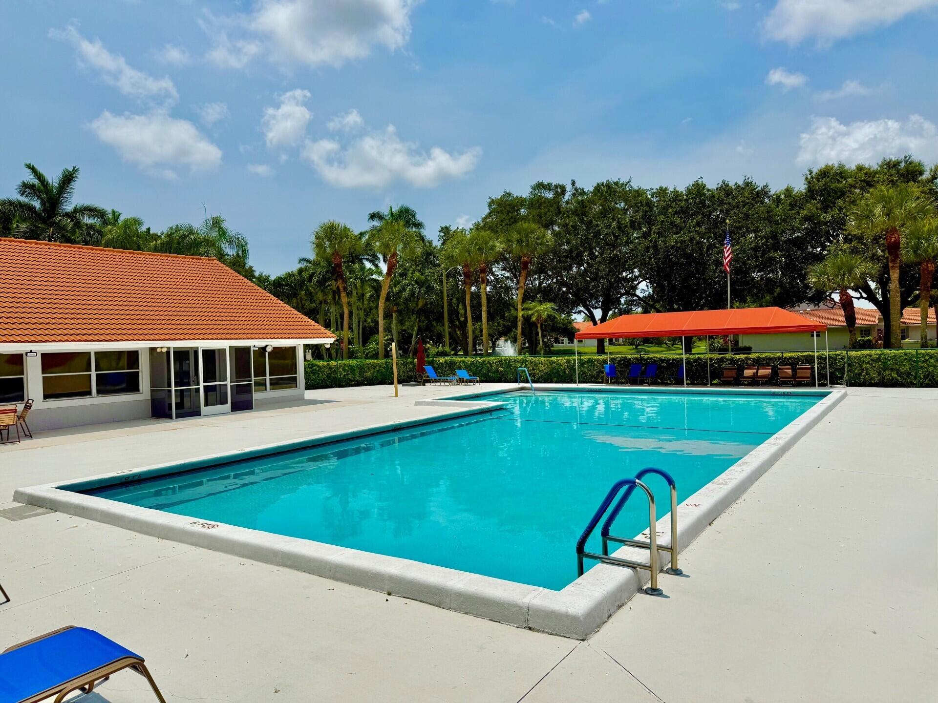 BEST VALUE IN WATERWAYS! Awesome and Move-in ready Villa w/ garage in gated community. Double front doors open to foyer & bright living space. Split-bedroom plan, updated 2nd bathroom w/glass enclosure. Huge primary suite features 2 closets, modern en-suite bath w/ dual vanities. Upgraded kitchen boasts natural stone countertops, new backsplash, stainless steel appliances, and charming herb garden window. A second flexible living/dining area off kitchen opens through sliding glass doors to a covered porch and outdoor deck, perfect for grilling or stargazing. Dedicated laundry room leads to the garage. Newer roof and paint. Conveniently located near highways, shopping, dining, and vibrant downtown Delray Beach.