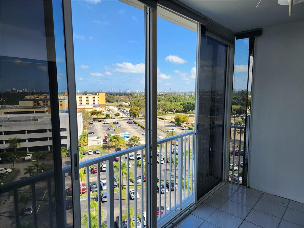 Spacious unit features remodeled master bath w/new vanity, upgraded linen closet, built-in medicine chest & custom shower. Large mstr bdrm w/2 closets & city views is freshly painted with new berber carpet & matching fan. Liv area tiled throughout w/large eat-in kitchen plus full sized dining area w/built-in cabinets. Unit includes permitted A/C & hot water tank in 2020 & 2021. Fully tiled patio w/sliding doors & full electric can be office/2nd bdrm. Bonus: Bldg upgrades include all new exterior resurfacing & paint plus new lobby & interior hallways.  Easy to show. Directions: