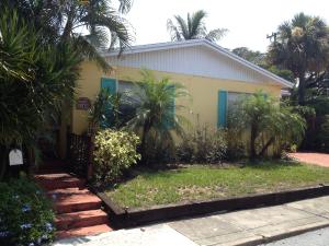 Charming and delightful 2 bedroom, 1 bath CBS home with Key West colors and details.  Raised steps lead to the covered front porch which has access to the east facing front door and entry level living area.  Large windows and Mexican tile floors are found throughout this little gem. An updated kitchen has great space lots of cabinets, a gas range, refrigerator with ice-maker, a dishwasher and is open to the living areas. Two large bedrooms and a recently tiled bath sparkles! The rear yard features a patio and is sweetly landscaped. This is a perfect retreat on quiet cul-de-sac street or a wonderfully complete rental property with little maintenance. Great location near all activities West Palm Beach has to offer! Two car driveway & off street parking completes this lovely and graceful hom