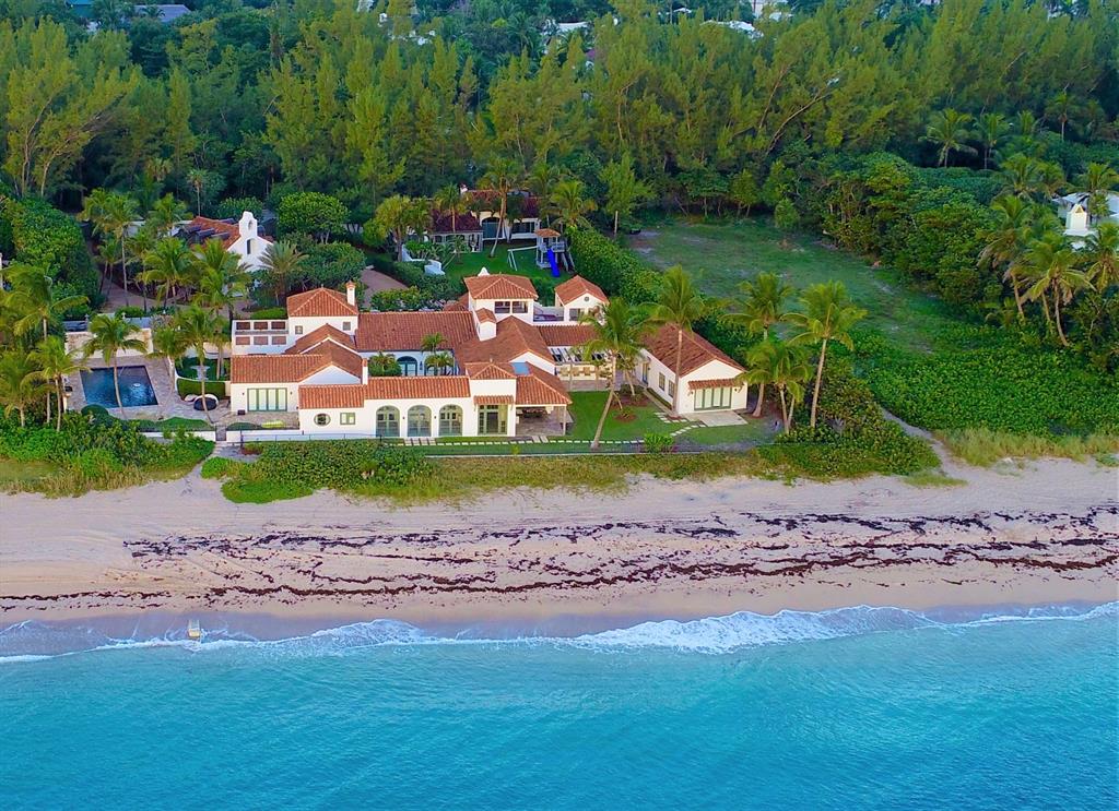 One of Gulf Streams most significant oceanfront estates sited on 200+/-' of pristine pink coral sand, 2817 N Ocean Blvd Gulf Stream, Fl, is a significant oceanfront compound with sweeping views along the Atlantic Ocean offering a rare opportunity for a buyer or investor to own a sliver of paradise. This original 1925 iconic oceanfront estate was redesigned inside and out by award winning architectural firm Bridges and Marsh. The finest of finishes and details grace this 12,623+/- sqft estate and an expansive floor plan includes 6 beautifully appointed bedrooms and 10.3 baths and 4 guest villas. Features include Tischler impact doors/windows, imported marbles, limestone floors, cypress cathedral ceilings, Paris ceramic tiles, two fireplaces, an oceanside office, a master suite with dramatic ocean views, master bath that opens to a private courtyard, an epicurean kitchen, full house generator, 4 car garage and a rooftop terrace commanding views of the ocean that are quite simply irresistible.