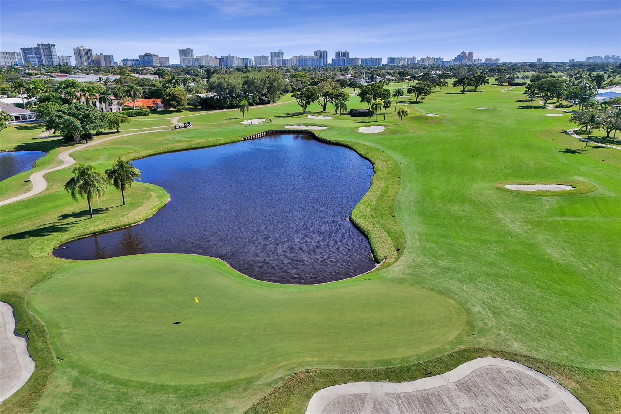 Located on the prestigious Coral Ridge Country Club golf course this corner unit has it all! Beautifully remodeled from top to bottom this light and bright condo features golf course and pool views from the spacious screened patio, an open kitchen floor plan with custom cabinetry, gorgeous quartz countertops, updated bathroom, recessed lighting, huge walk-in closet, several impact windows and more!  Located approximately one mile to the beach and close to excellent restaurants, hospitals and shopping!  All assessments have been paid by the seller.
