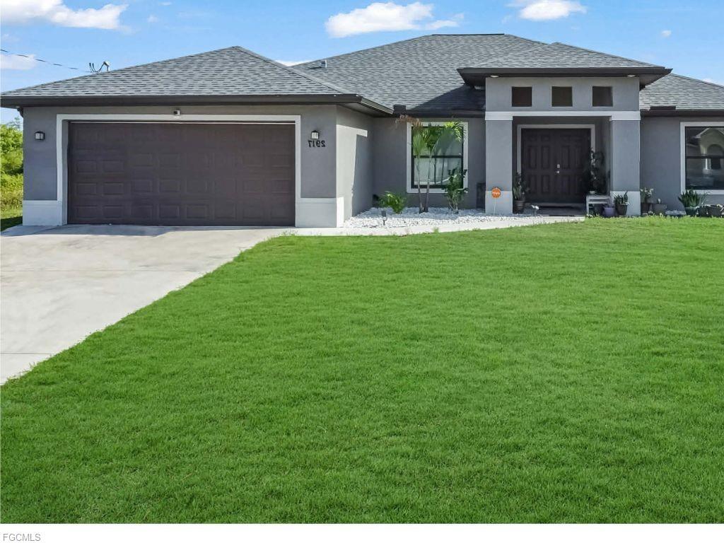 This beautifully maintained 4-bedroom plus den,2 bath,2 car garage,2157 sqft home located in a quiet and rapidly growing area of Lehigh Acres.This thoughtfully designed home features interior porcelain tile floors throughout whole house, wood cabinet with granite countertop, stainless steel kitchen appliances,impact windows. Enjoy the split-bedroom layout offering privacy for the primary suite, which offers a his and hers closets, with a French glass door that provides personal access to the screened lanai. Primary bathroom features a dual sink vanity, tiled shower & tub.Conveniently located near shopping, schools, parks, and with easy access to SR-82 for commuting to Fort Myers or I-75. Whether you're a first-time buyer, investor this home offers exceptional value and is priced to sell.
