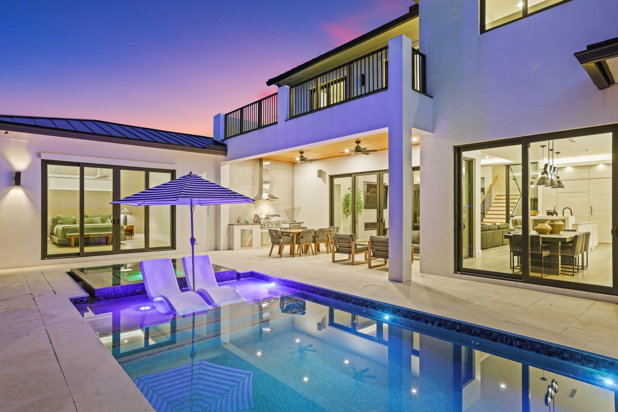 Introducing an extraordinary, one-of-a-kind custom residence conceived by acclaimed architect Richard Jones. From the moment you step inside, you are immersed in an unmatched sense of style and comfort. Every detail has been thoughtfully curated—from the exceptional layout to the architectural design and custom illumination—all set on an extended 12,000+ sq. ft. lot. This expansive residence offers five bedrooms plus an office/den, five full bathrooms, and one half bath. It showcases top-of-the-line finishes and features, including a whole-home generator, custom pool and spa with sun shelf, complete Aqualink pool automation and lighting, high-end Miele and Wolf appliances, FPU natural gas, security cameras, Sonos sound system, and custom Lutron lighting and automation throughout. Every space is highlighted by low-voltage accent lighting, elevating the home's sophisticated ambiance. This property is the definition of luxury and is sure to impress even the most discerning buyer.

Located just minutes from Downtown Delray's renowned Atlantic Avenue and award-winning beaches, this residence combines an ideal location with unparalleled craftsmanship and designtruly a one-of-a-kind opportunity. Schedule your private tour today.

DISCLAIMER: Information published or otherwise provided by the listing company and its representatives including but not limited to prices, measurements, square footages, lot sizes, calculations, statistics, and videos are deemed reliable but are not guaranteed and are subject to errors, omissions or changes without notice. All such information should be independently verified by any prospective purchaser or seller. Parties should perform their own due diligence to verify such information prior to a sale or listing. Listing company expressly disclaims any warranty or representation regarding such information. Prices published are either list price, sold price, and/or last asking price. The listing company participates in the Multiple Listing Service and IDX.DISCLAIMER: Information published or otherwise provided by the listing company and its representatives including but not limited to prices, measurements, square footages, lot sizes, calculations, statistics, and videos are deemed reliable but are not guaranteed and are subject to errors, omissions or changes without notice. All such information should be independently verified by any prospective purchaser or seller. Parties should perform their own due diligence to verify such information prior to a sale or listing. Listing company expressly disclaims any warranty or representation regarding such information. Prices published are either list price, sold price, and/or last asking price. The listing company participates in the Multiple Listing Service and IDX.