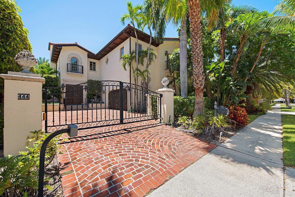 This elegant townhome is ideally located in close proximity to Worth Avenue, the town docks, the beach, restaurants and shopping. The residence offers the ultimate in privacy with a gated entry and mature landscaping. Built in 1999, the 5,255 +/- total square foot townhome has 3 bedrooms, 3 and a half baths, a lap pool and a 2-car garage. Enjoy both indoor and outdoor entertaining in the spacious living and dining areas and the outdoor patio and covered Loggia. The kitchen is complete with stainless steel appliances, a gas range and ample storage. A media/family room is located off of the kitchen with doors leading out to the pool. A private guest bedroom is situated off of the covered Loggia with an en-suite bath and closet. The master suite, and an additional guest bedroom This elegant townhome is ideally located in close proximity to Worth Avenue, the town docks, the beach, restaurants and shopping.  The residence offers the ultimate in privacy with a gated entry and mature landscaping.  Built in 1999, the 5,255 +/- total square foot townhome has 3 bedrooms, 3 and a half baths, a lap pool and a 2-car garage.  Enjoy both indoor and outdoor entertaining in the spacious living and dining areas and the outdoor patio and covered Loggia.  The kitchen is complete with stainless steel appliances, a gas range and ample storage.  A media/family room is located off of the kitchen with doors leading out to the pool.  A private guest bedroom is situated off of the covered Loggia with an en-suite bath and closet.  The master suite, and an additional guest bedroom are located on the second floor.  The master suite offers a large walk-in closet, a generous bath with a separate tub and shower, and a sitting room/library with a fireplace.  Other features include, an elevator, generator, laundry room, a lap pool and 2 fireplaces.