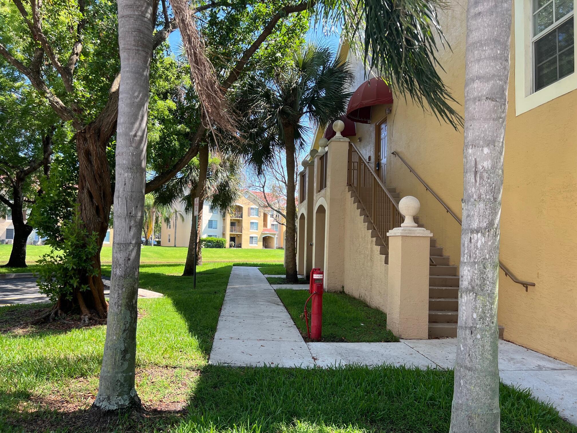 Second floor corner unit with private entrance. Vaulted ceiling. Vinyl flooring in living room and carpet in bedrooms. Rent includes water + sewer + basic cable and HIGH SPEED INTERNET. Great location! Gated resort style community close to shopping, downtown WPB, City Place, and more. Community is located a few minutes from the Houston Astros and Washington Nationals Spring Training Stadium. Community has a beautiful resort style pool, hot tub with massaging jets, full gym, racquetball/basketball court, tennis court, volleyball court and children's playground.