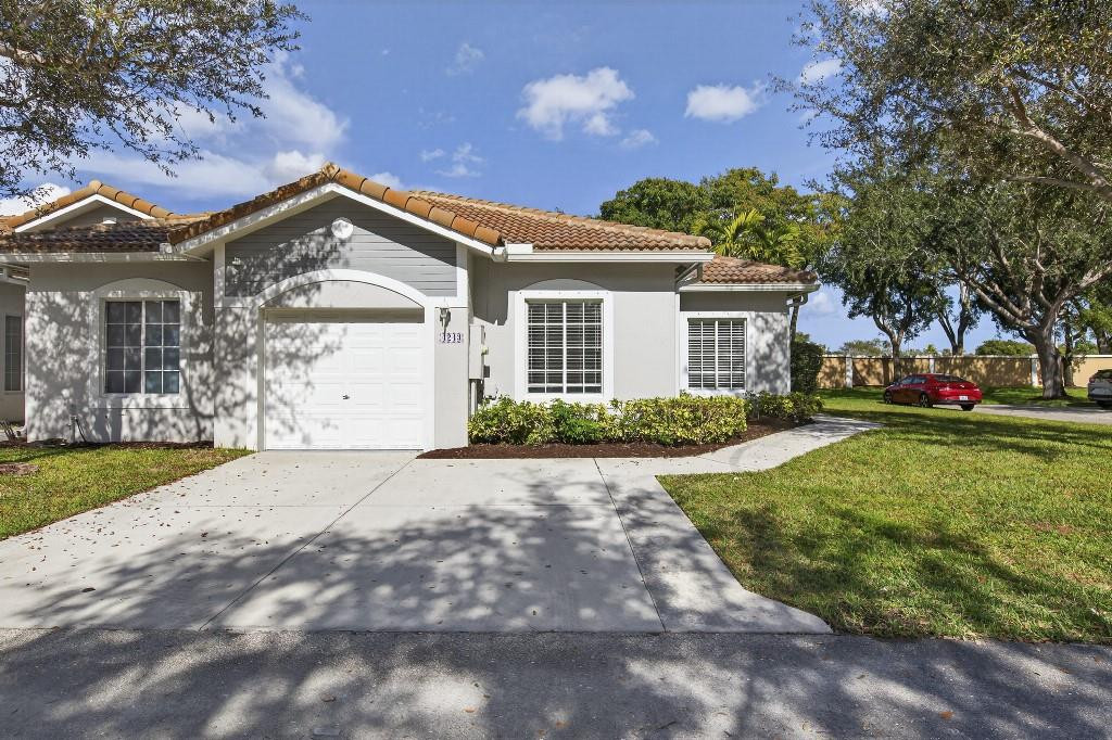 Step into this fully renovated 3-bed, 2-bath corner-lot home where timeless elegance meets modern luxury. Reimagined top to bottom, it shows like a brand-new build with no detail overlooked. Rich wood-grain, water-resistant flooring flows throughout. The designer kitchen features quartz countertops, stainless steel appliances, soft-close cabinetry, and bold gold hardware. Spa-inspired baths offer LED mirrors, marble-style tile, gold rainfall fixtures, and a double-sink primary vanity. Enjoy heated pools, pickleball, fitness center, two clubhouses, 24-hour security, and a boat-friendly lake. HOA covers roof and lender-required insurance.