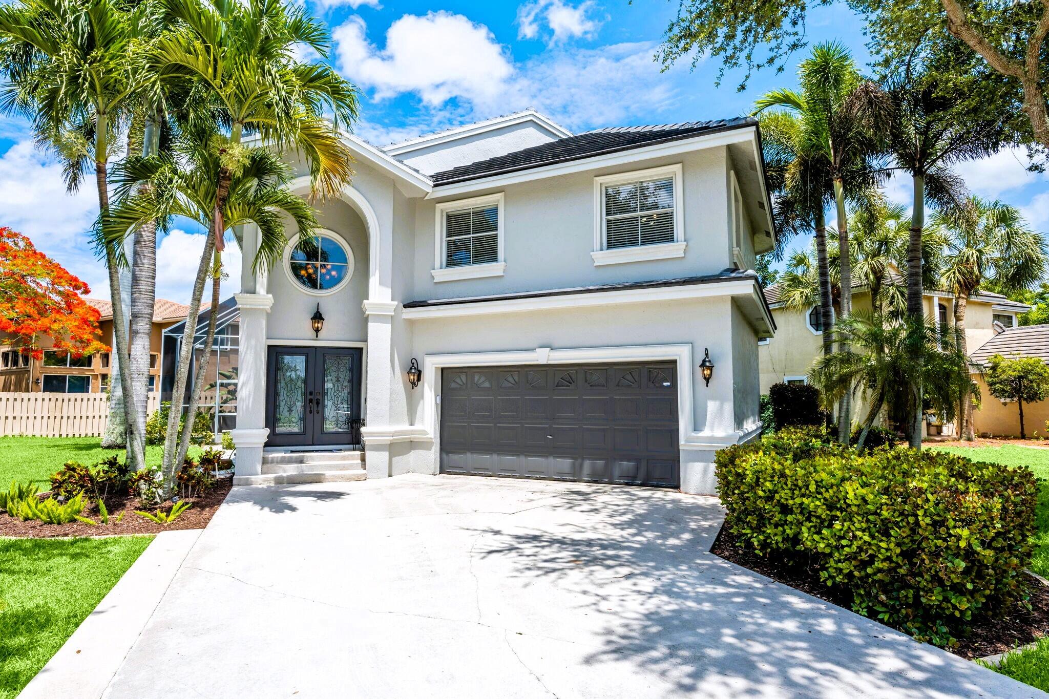 NEW ROOF! Exceptional 4-bedroom, 2.5-bath POOL home in the GATED community of Sable Pass. Featuring soaring volume ceilings, beautiful wood flooring, a dramatic formal living & dining room, and spacious family room. The kitchen is equipped with newer stainless steel appliances, a casual eat-in area, and breakfast bar seating that opens to the main family room space. Enjoy outdoor living from the screened pool and patio, while the upstairs primary bedroom offers a private balcony. Conveniently located in the heart of Parkland near top-rated schools, parks, shopping, and dining.
