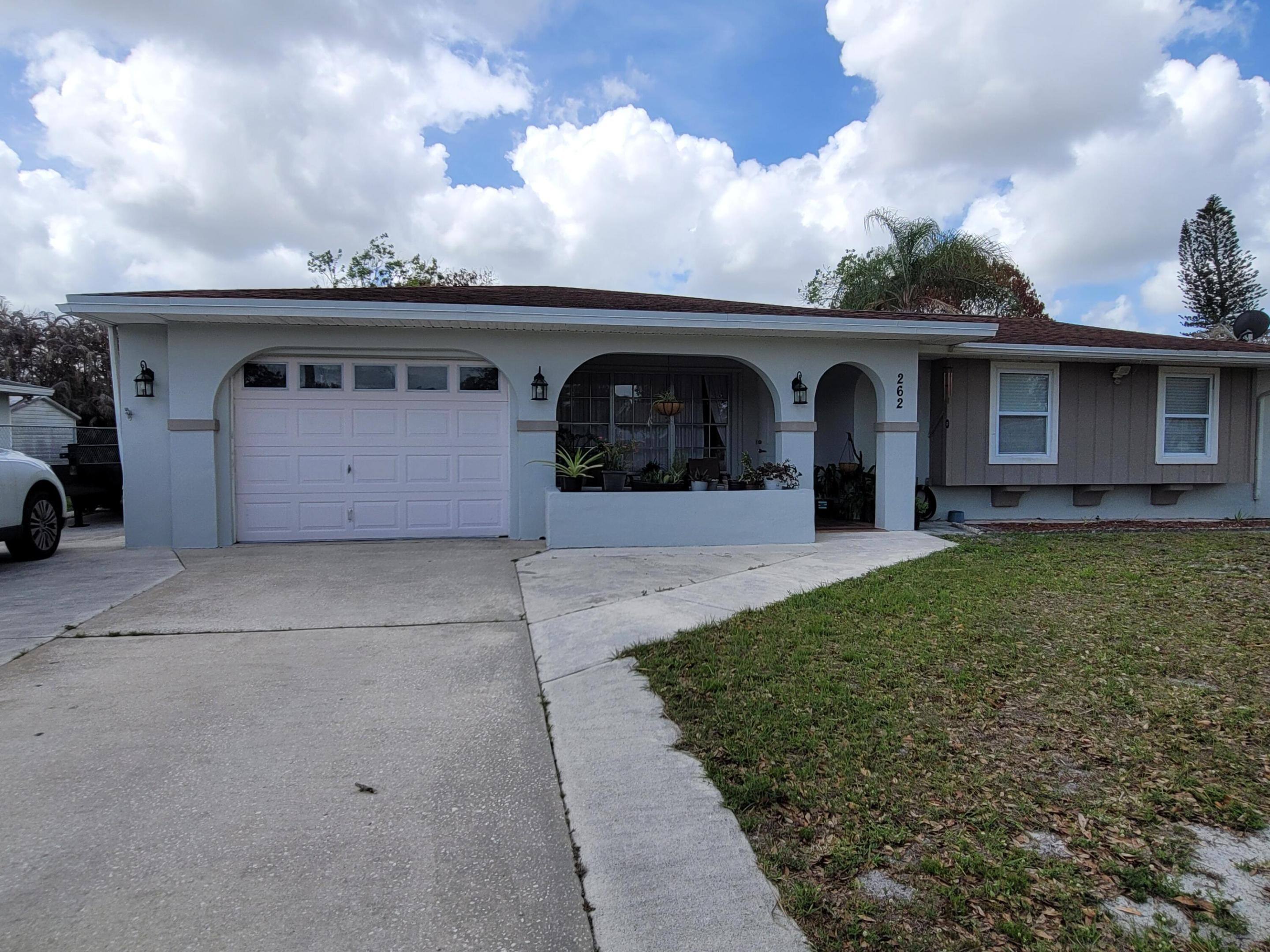 MOVE IN READY HOME. In the heart of Port St Lucie, Florida.  3 Bedrooms and 2 baths. Step inside and you will feel like Home.  With a completely remodeled kitchen and floors in (2026), wood and cabinets, new stainless-steel appliances, beautiful quartz countertop.  Completely redone master bath & 2nd bath with exceptional good taste.  Ample space in your living areas for your family and friends.  1 car garage(22x14) with a lot of space for storage.  Huge back yard with a mango tree. For the drivers in the family Home is very close to schools, shopping plazas, Publix, Walmart, Home Depot, Walgreens restaurants, St James Golf Club, River Park & Marina, gas stations.  Short drive to I-95 and Beaches. Bring your RV or Boat. Roof replaced in 2014, A/C 2021. OWNER MOTIVATED TO SELL... CALL TODAY Sold As-Is, Roof replaced 2014, A/C replaced motor 2021, water heater is 2023, completely redone kitchen and new laminate floors in 2026, redone master bath and 2nd bath in 2025. All appliances stay including washer and dryer.