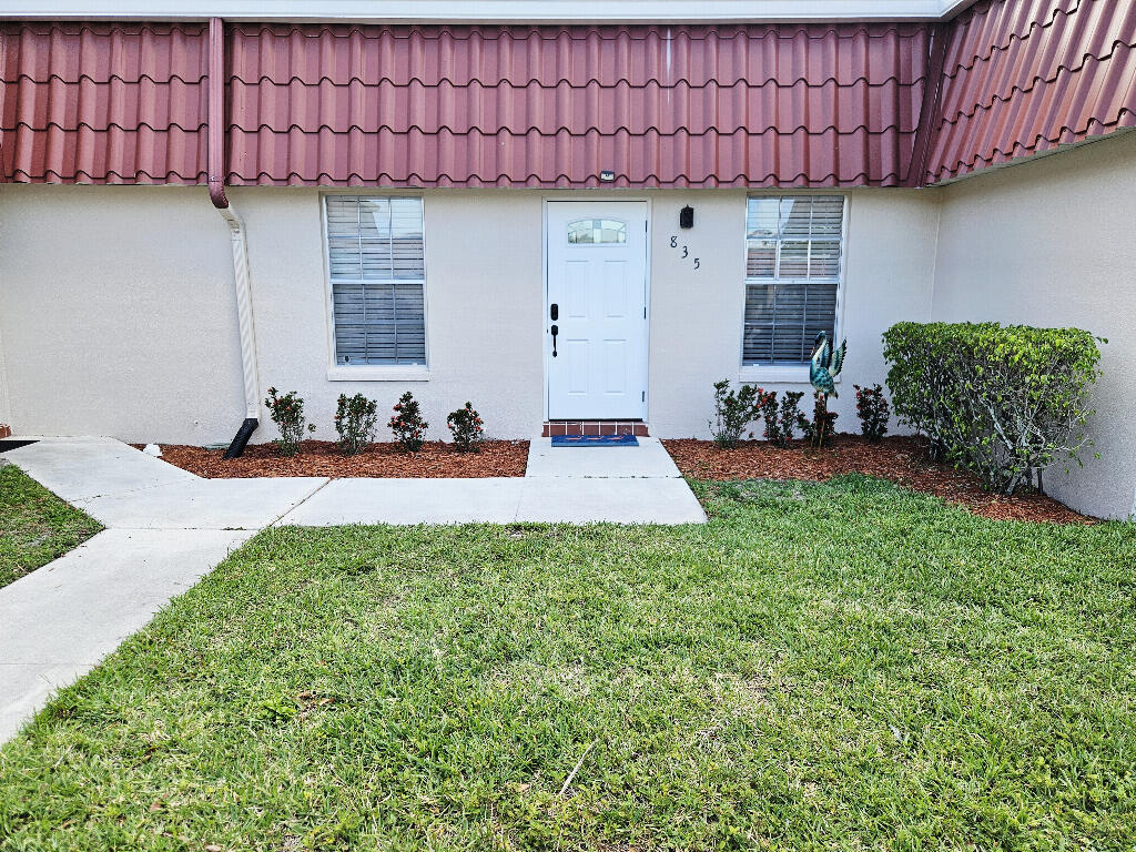 Welcome to your stunning fully renovated, move in ready, 1-bedroom 1-bathroom condominium in the desirable 55+ Covered Bridge Community in Lake Worth. The brand new renovation includes new custom kitchen cabinets, new granite counters, new bathroom, new hurricane rated front door, new patio rescreening, new luxury vinyl floors, new textured ceilings (no popcorn), new baseboard, new recessed lighting, and new interior and exterior paint. The dream kitchen includes a brand-new premium GE stainless steel appliance package.  The new updated custom kitchen includes custom all wood shaker cabinets with soft close doors and drawers, along with a huge custom pantry for additional storage. The granite countertops are complimented by the full matching granite backsplash. This bright home features new luxury vinyl plank flooring throughout the entire house with new modern 5 1/4" baseboard. The bathroom features new, large format porcelain tile with a coordinating glass tile band, along with a premium bypass glass shower door. The new full size GE stackable washer and dryer offers the convenience of doing laundry on your own schedule. The home is complete with stylish new window treatments.  Enjoy outdoor living in the covered, screened back patio which can be enjoyed all year. For added peace of mind, the villa features a new roof (2023) and has no current or upcoming assessments. Located in a prime, private location, this villa offers great tranquility and serenity. The pet-friendly community offers an active lifestyle, complete with walking and biking trails, a clubhouse, heated pools, fitness center, tennis courts, daily activities, and more. The condo fees include internet, cable, water, exterior maintenance, exterior insurance, and full access to all amenities, allowing you to focus on enjoying life to the fullest. This spectacular upgraded villa is truly move-in ready and waiting for you to call it home and is close to fine dining, shopping, and hospitals.  Option to purchase the condo furnished.